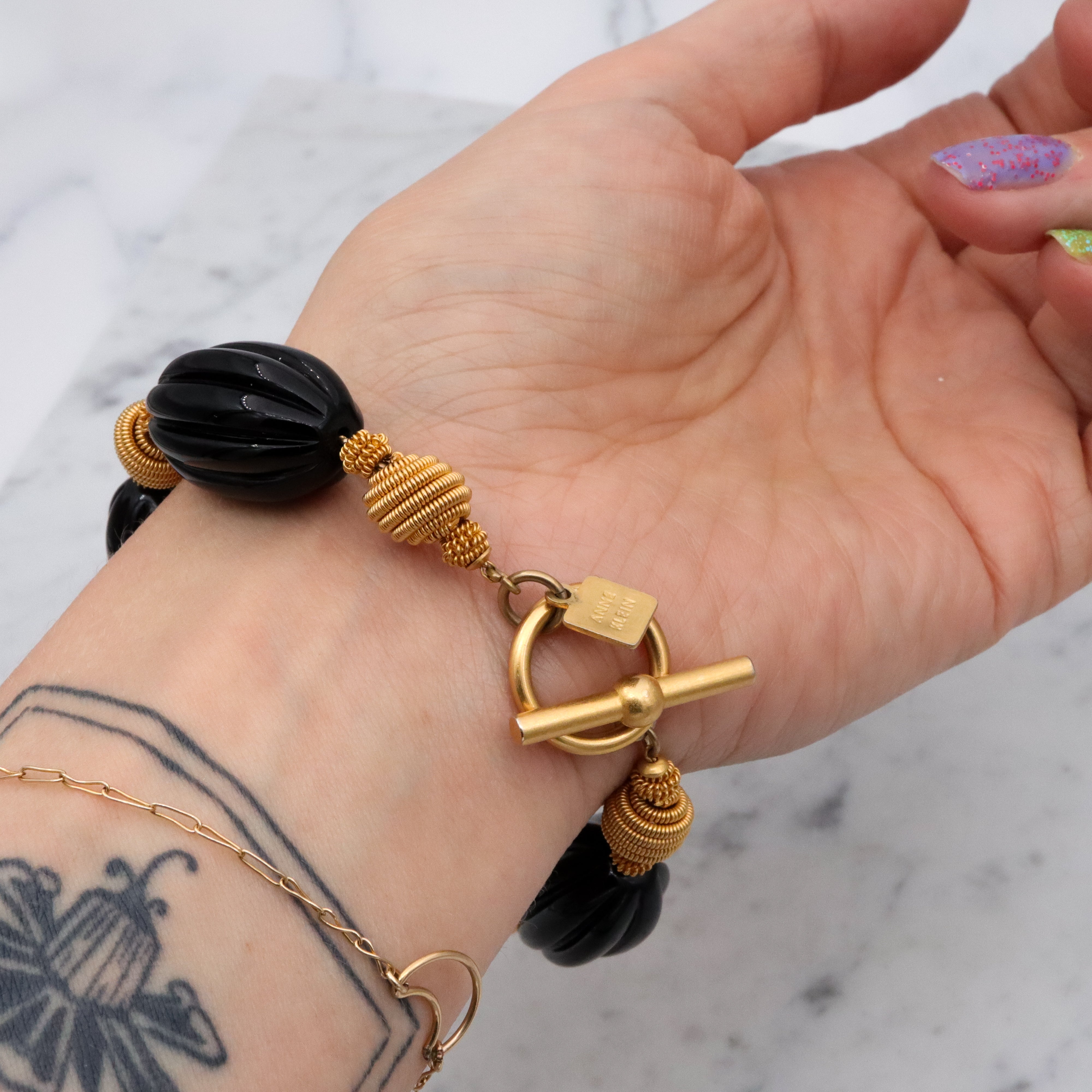 90s Anne Klein black & gold beaded bracelet w/toggle clasp