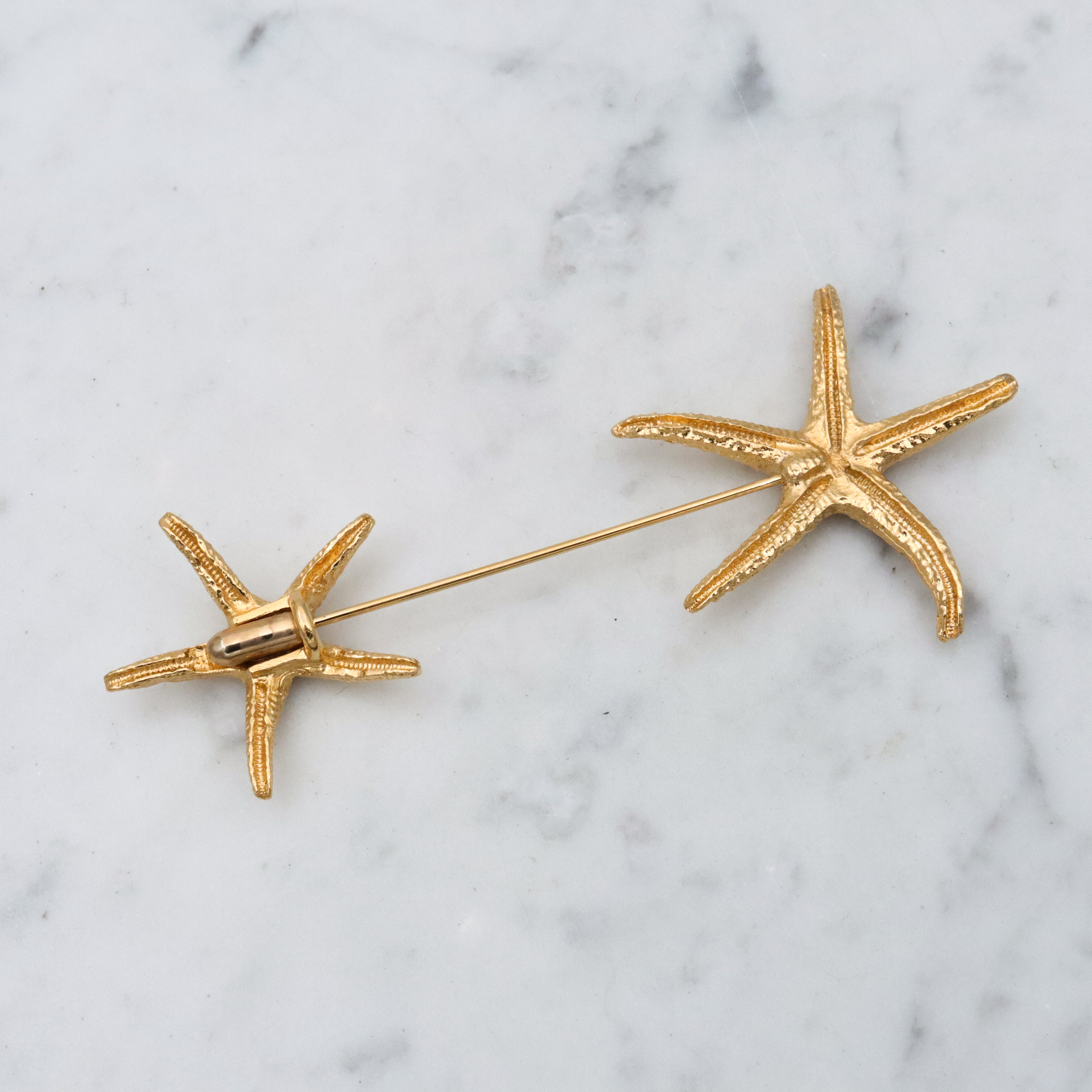 Vintage gold tone double starfish jabot pin