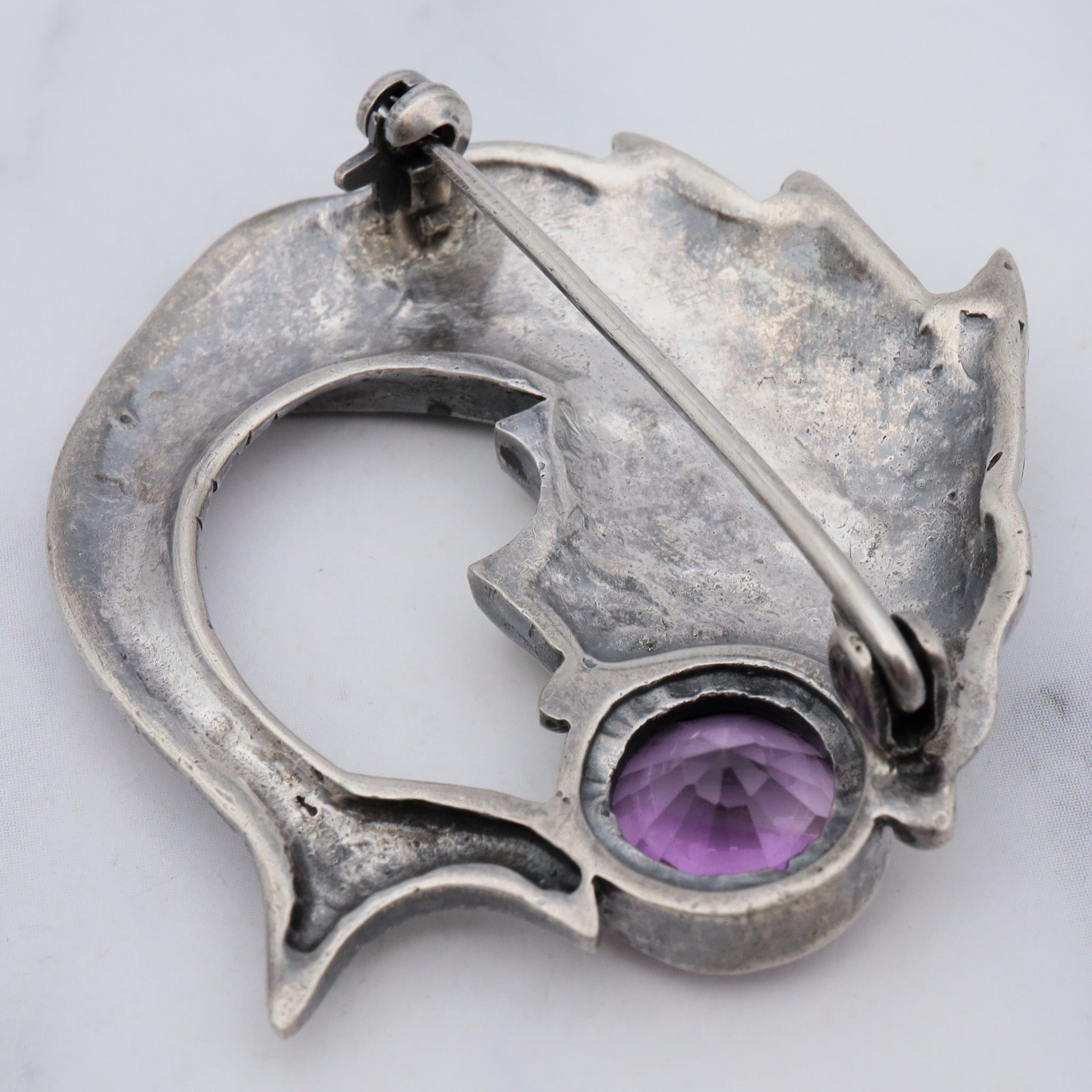 Vintage sterling February Pisces brooch with amethyst and marcasite