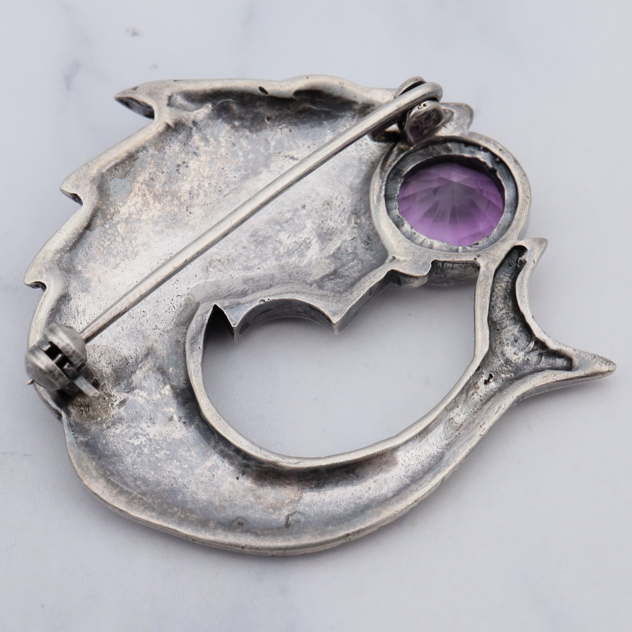 Vintage sterling February Pisces brooch with amethyst and marcasite