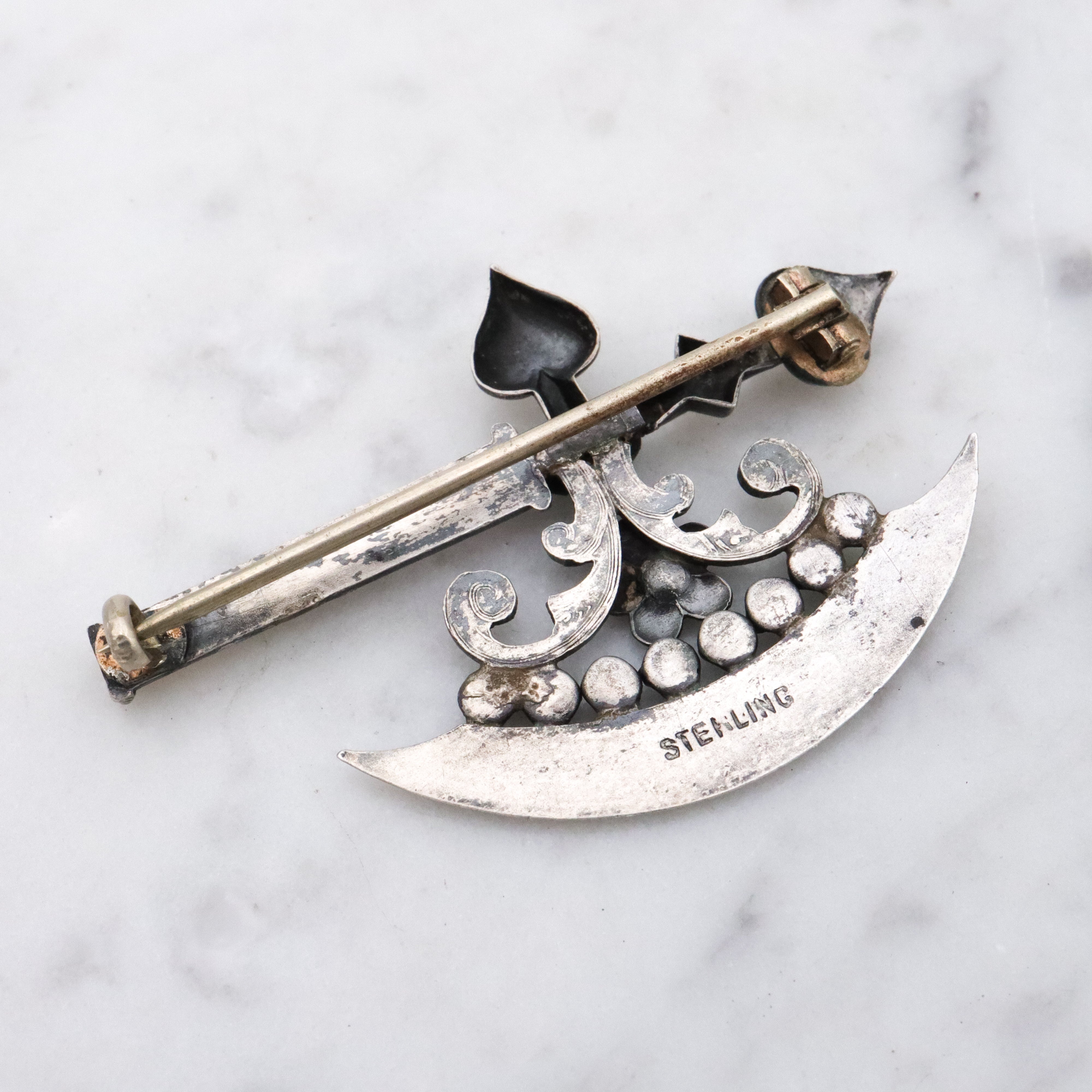 Rare Antique Victorian sterling fancy battle axe brooch with emerald paste gems