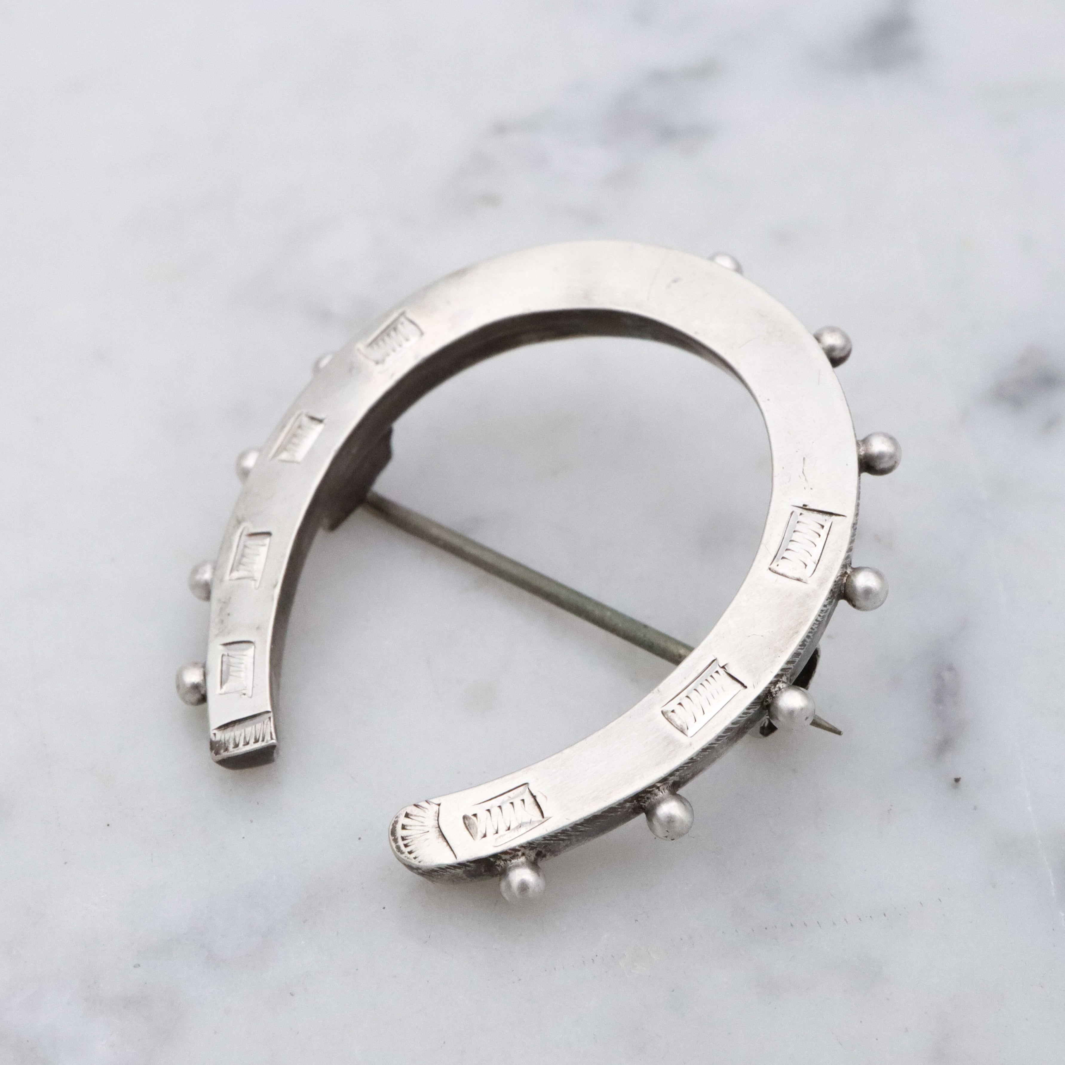 Victorian English sterling handmade horseshoe brooch