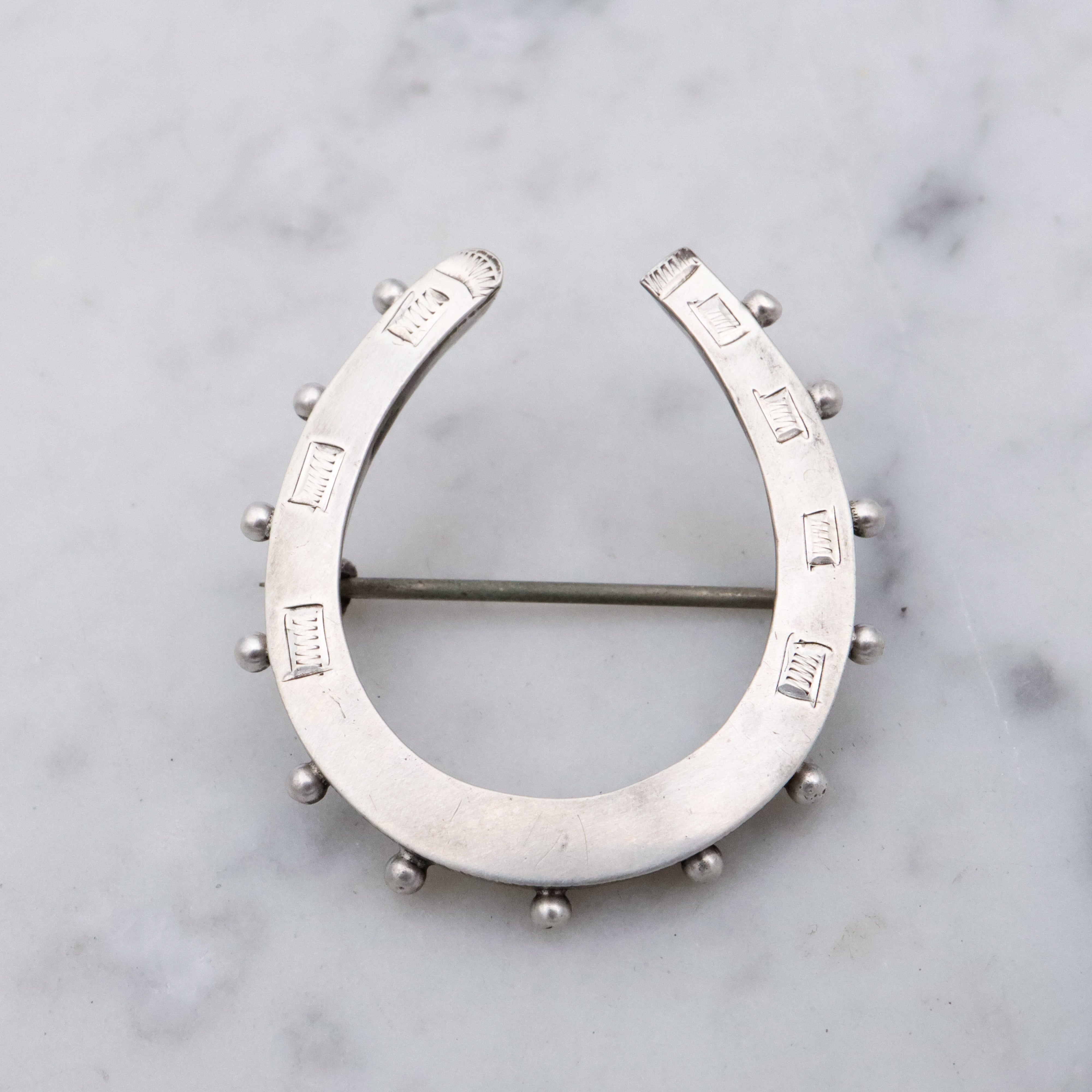 Victorian English sterling handmade horseshoe brooch