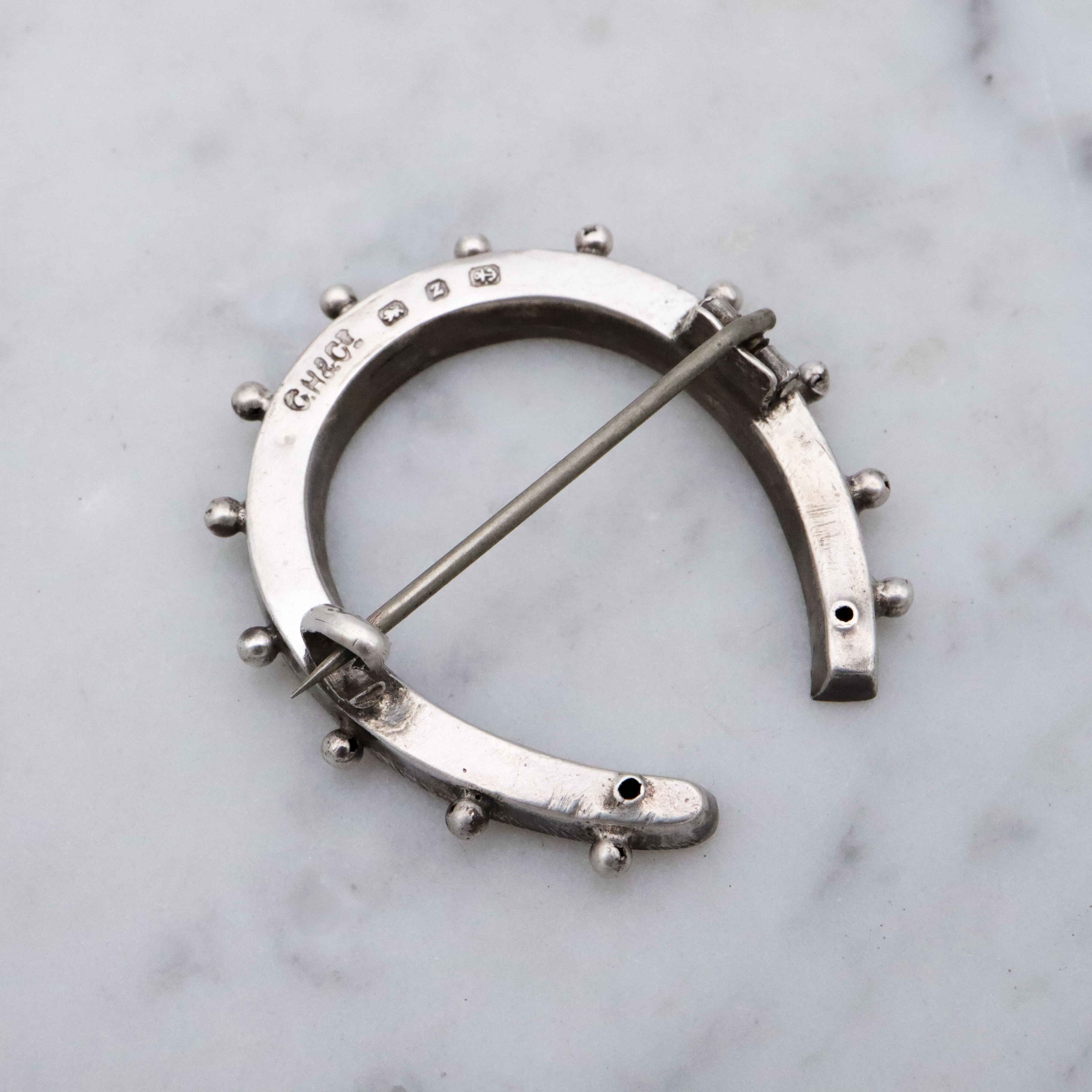 Victorian English sterling handmade horseshoe brooch
