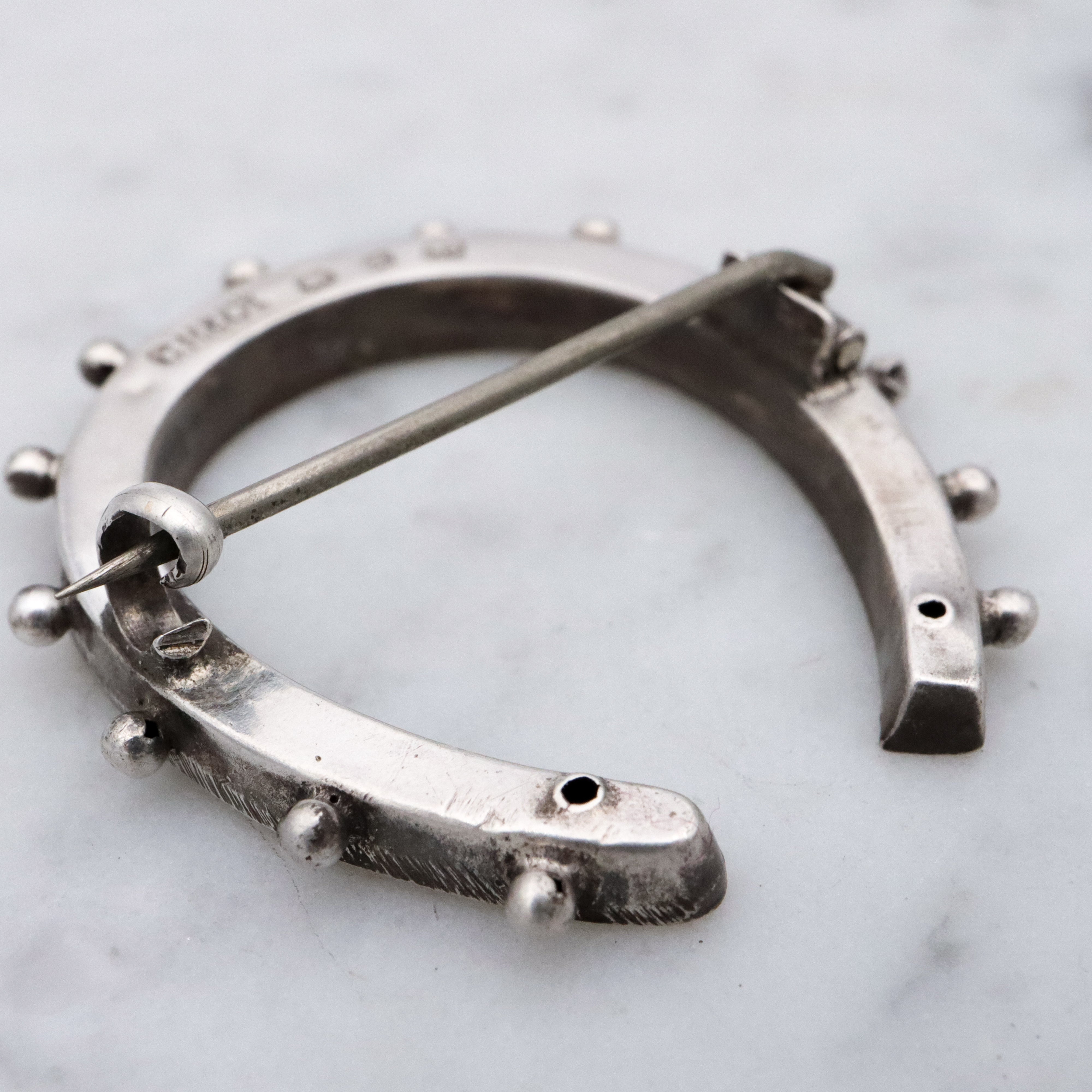 Victorian English sterling handmade horseshoe brooch