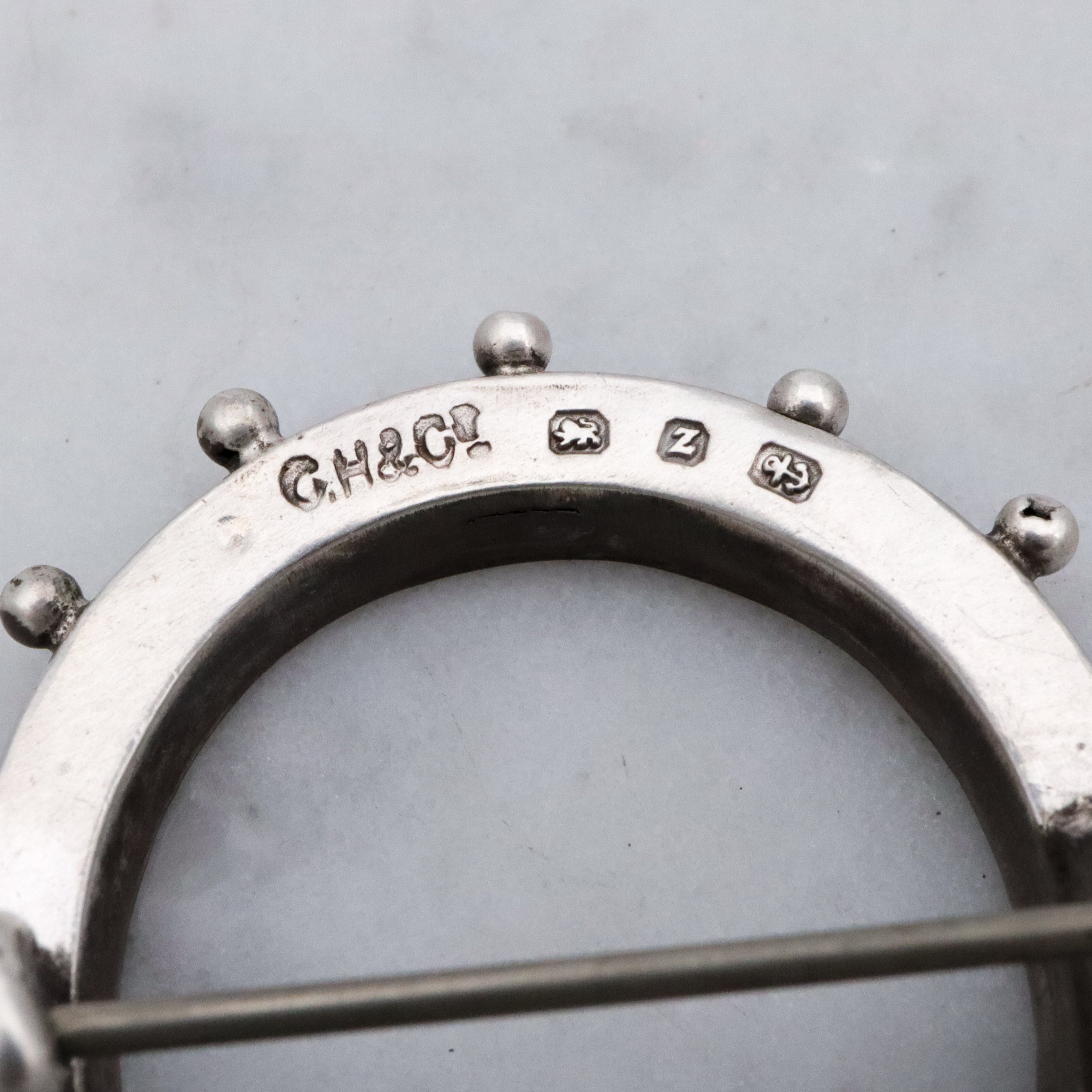 Victorian English sterling handmade horseshoe brooch