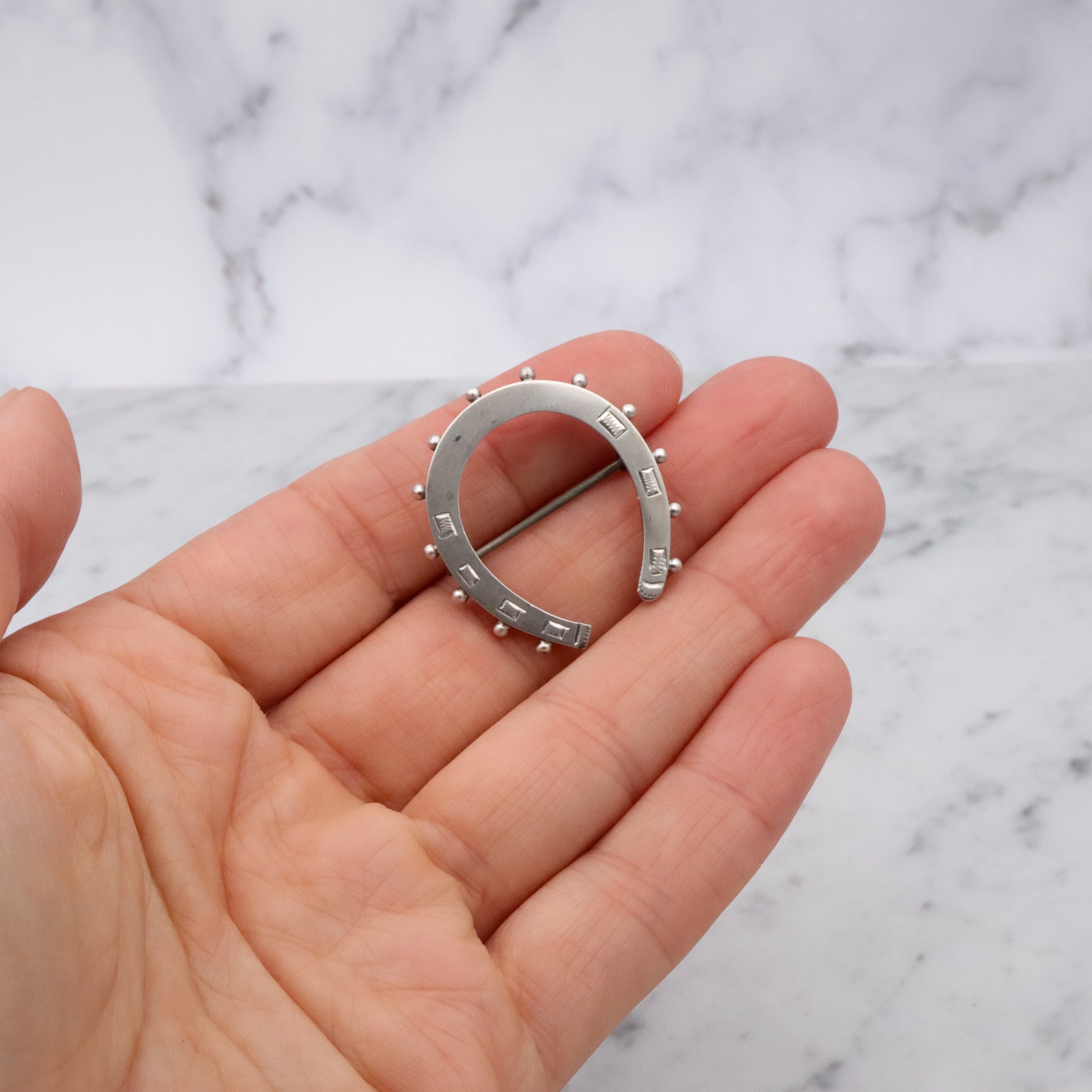 Victorian English sterling handmade horseshoe brooch