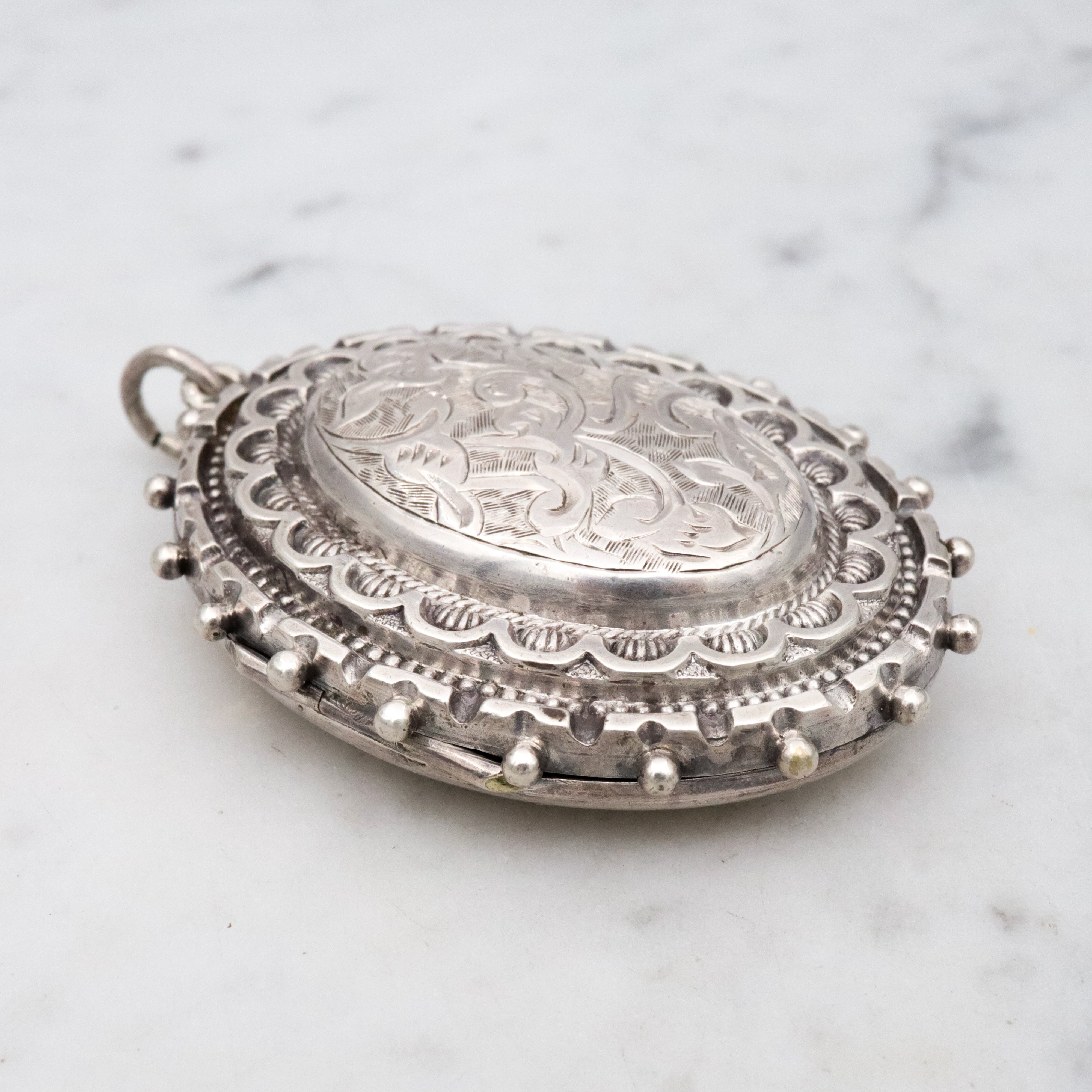 Antique Victorian Etruscan Revival English sterling large oval locket
