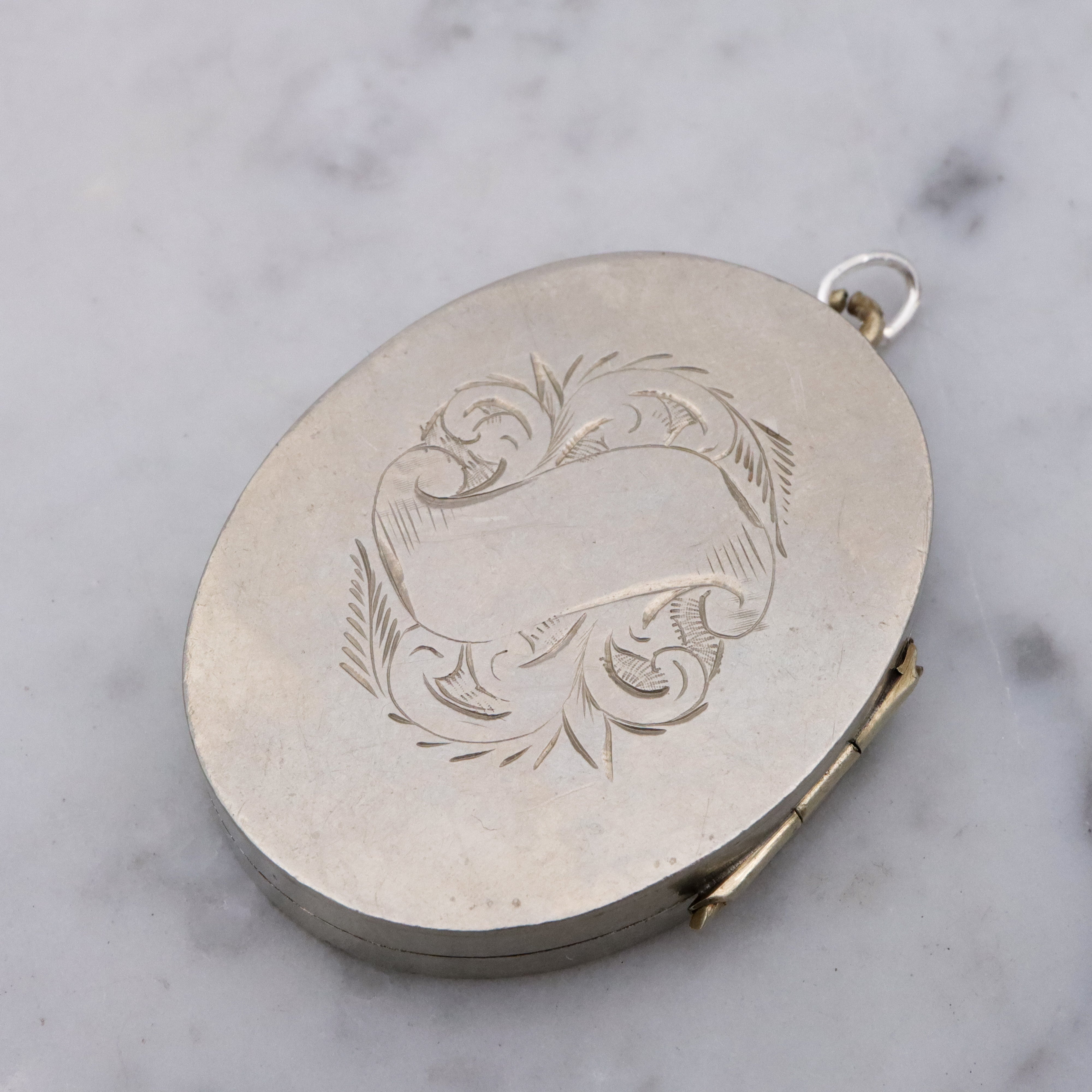 Victorian silver plated Aesthetic engraved swallow locket