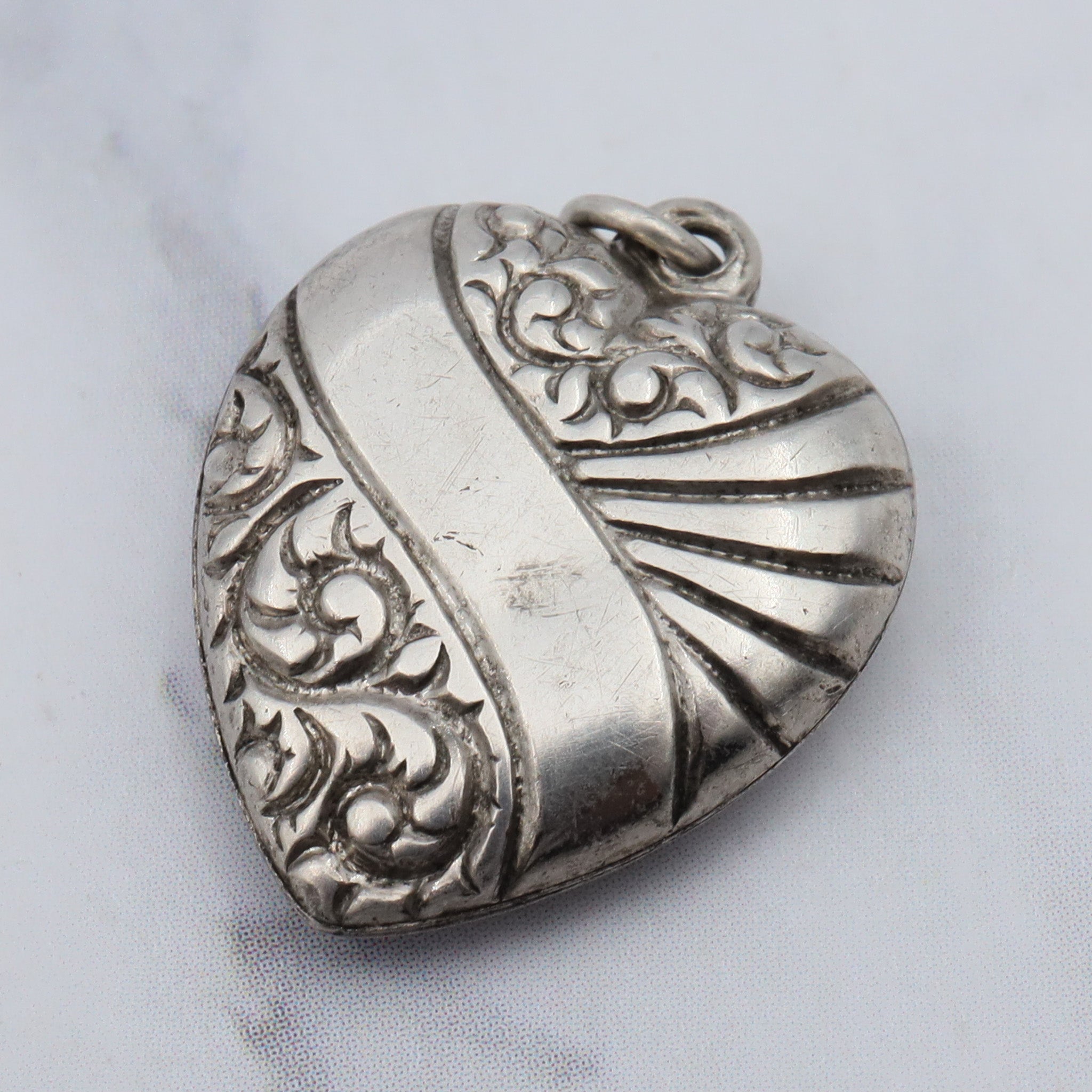 Antique Victorian sterling engraved puffy heart charm