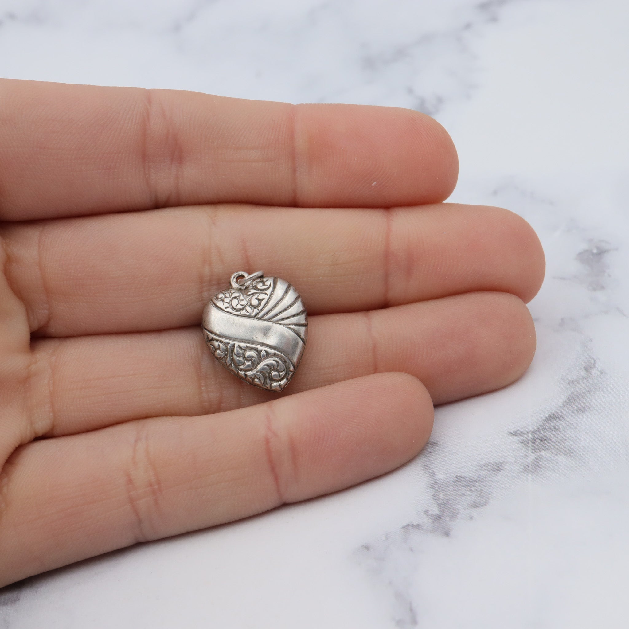 Antique Victorian sterling engraved puffy heart charm