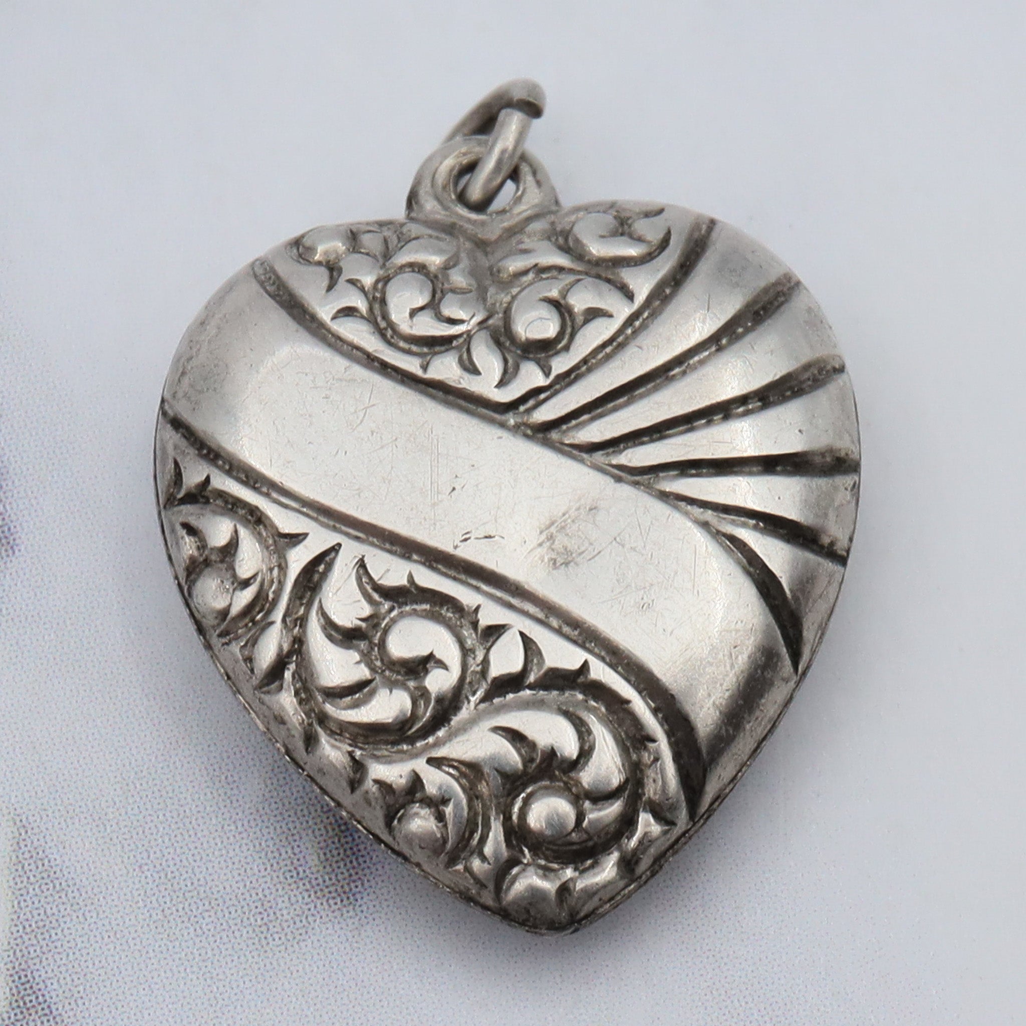 Antique Victorian sterling engraved puffy heart charm