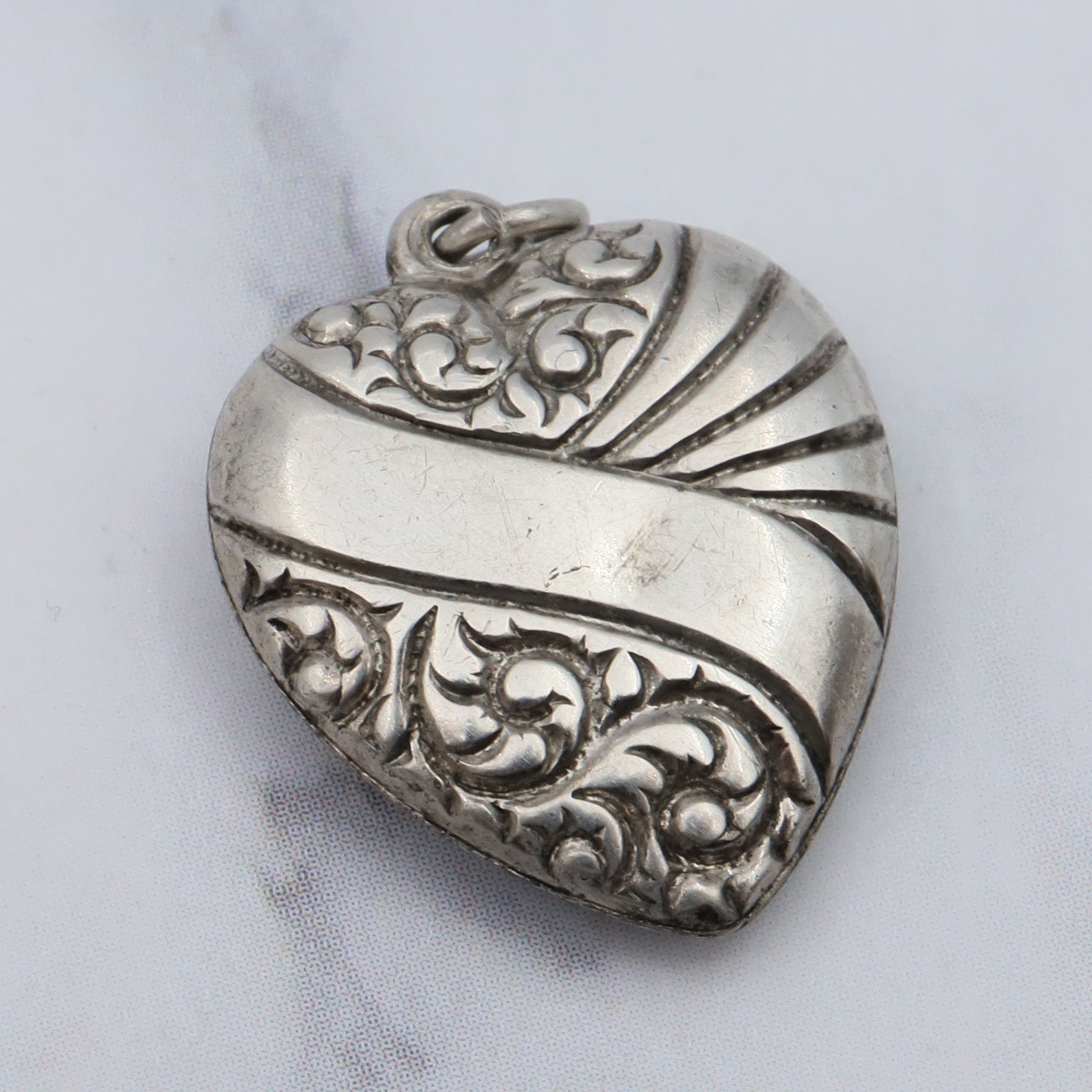 Antique Victorian sterling engraved puffy heart charm
