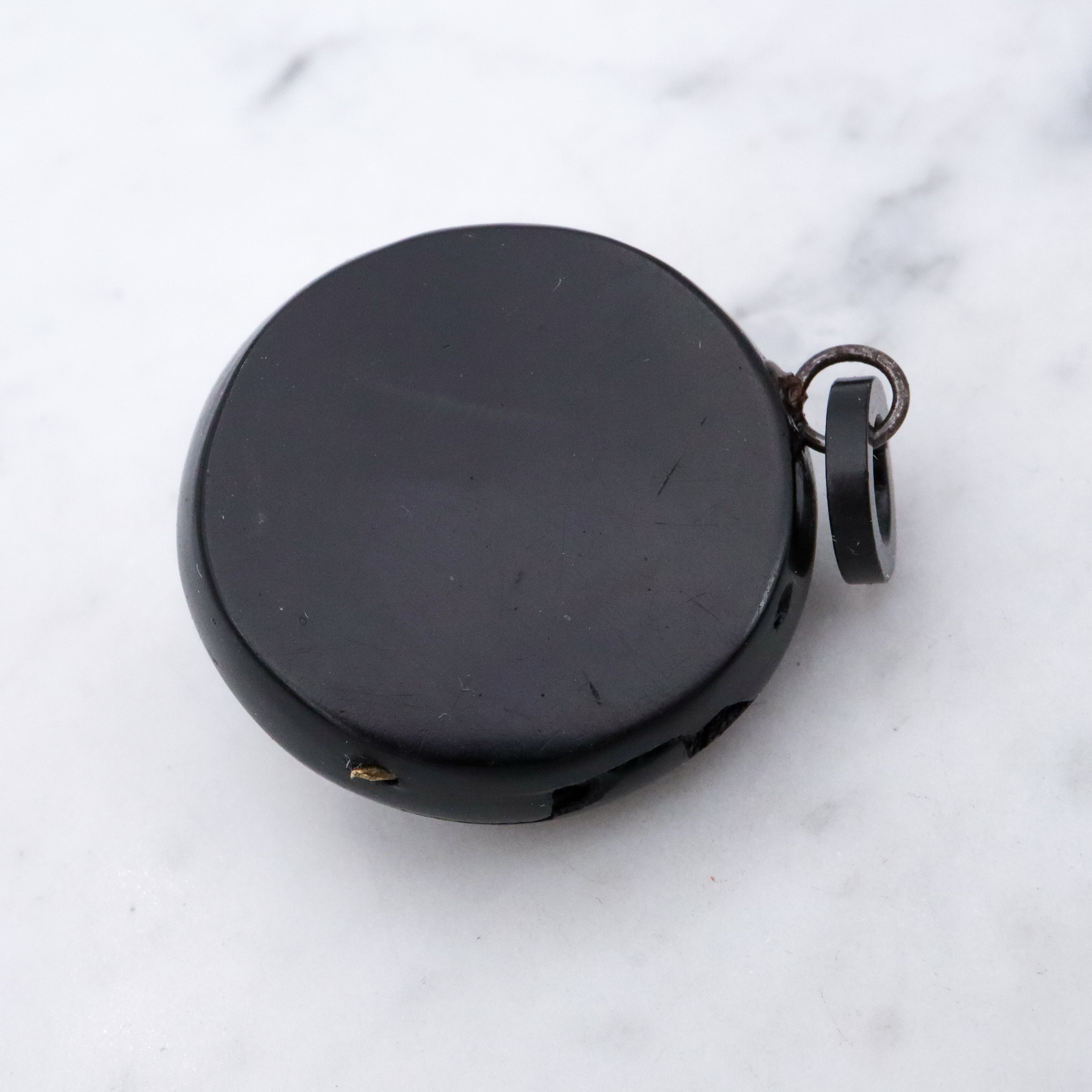 Victorian gutta percha flower round small mourning locket