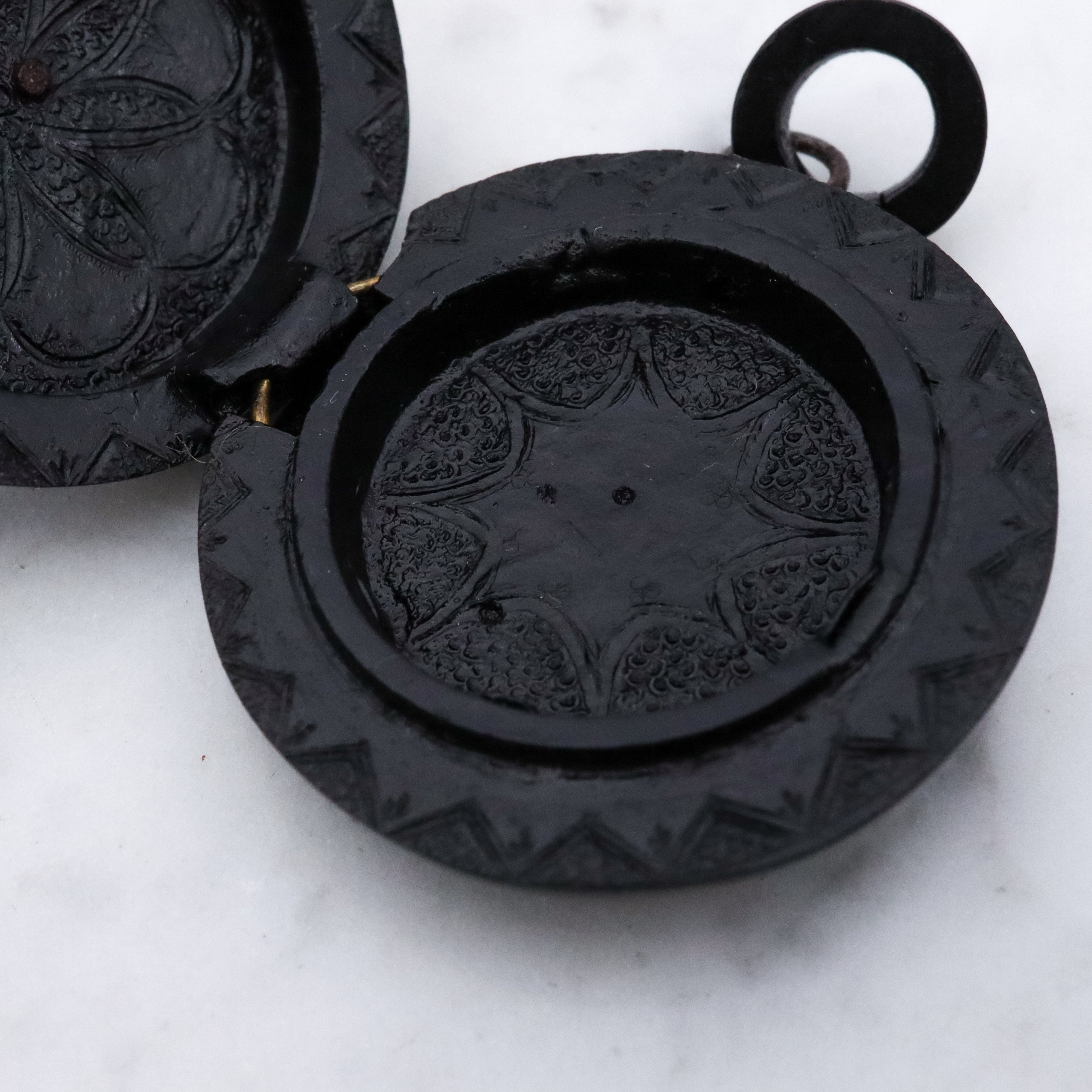 Victorian gutta percha flower round small mourning locket