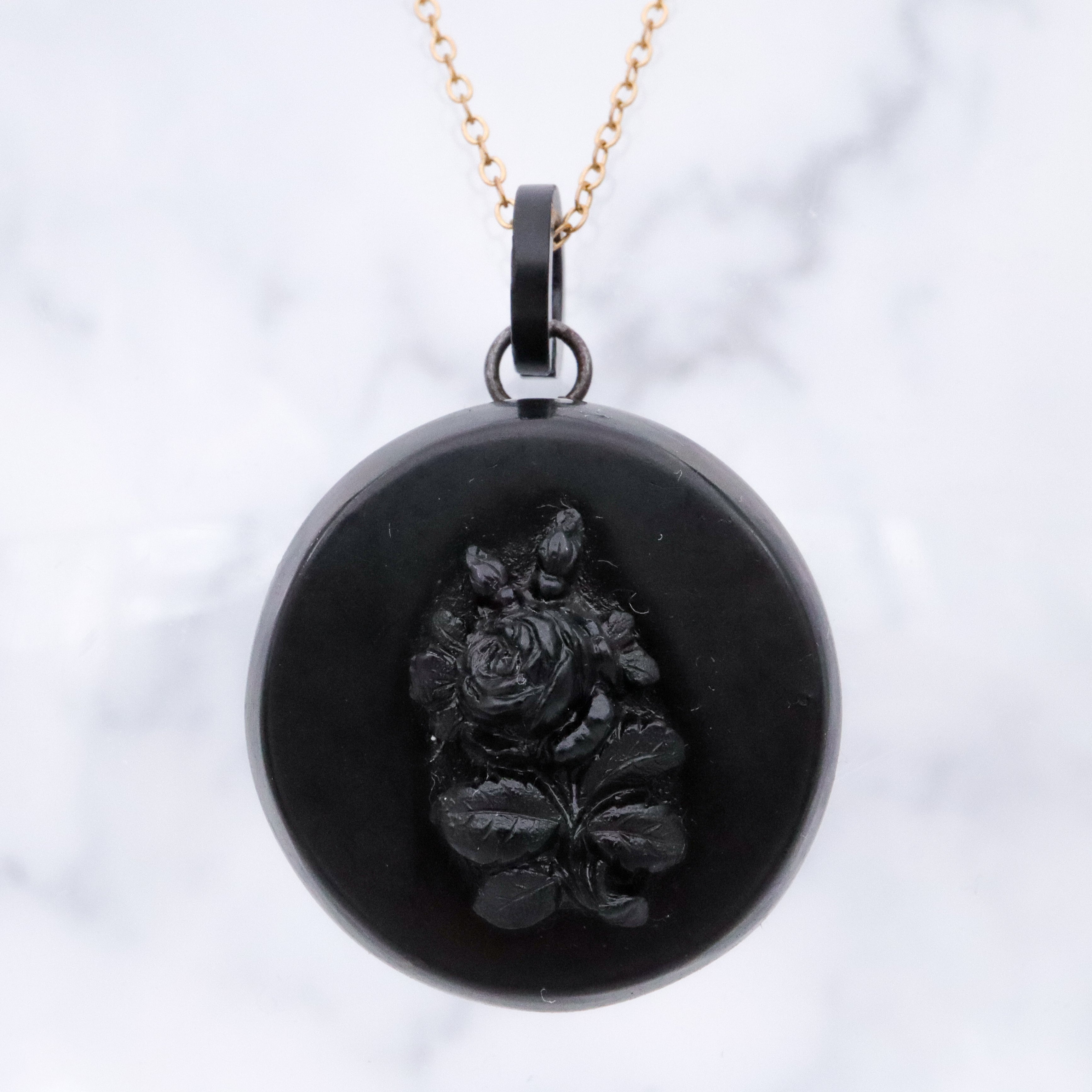Victorian gutta percha flower round small mourning locket