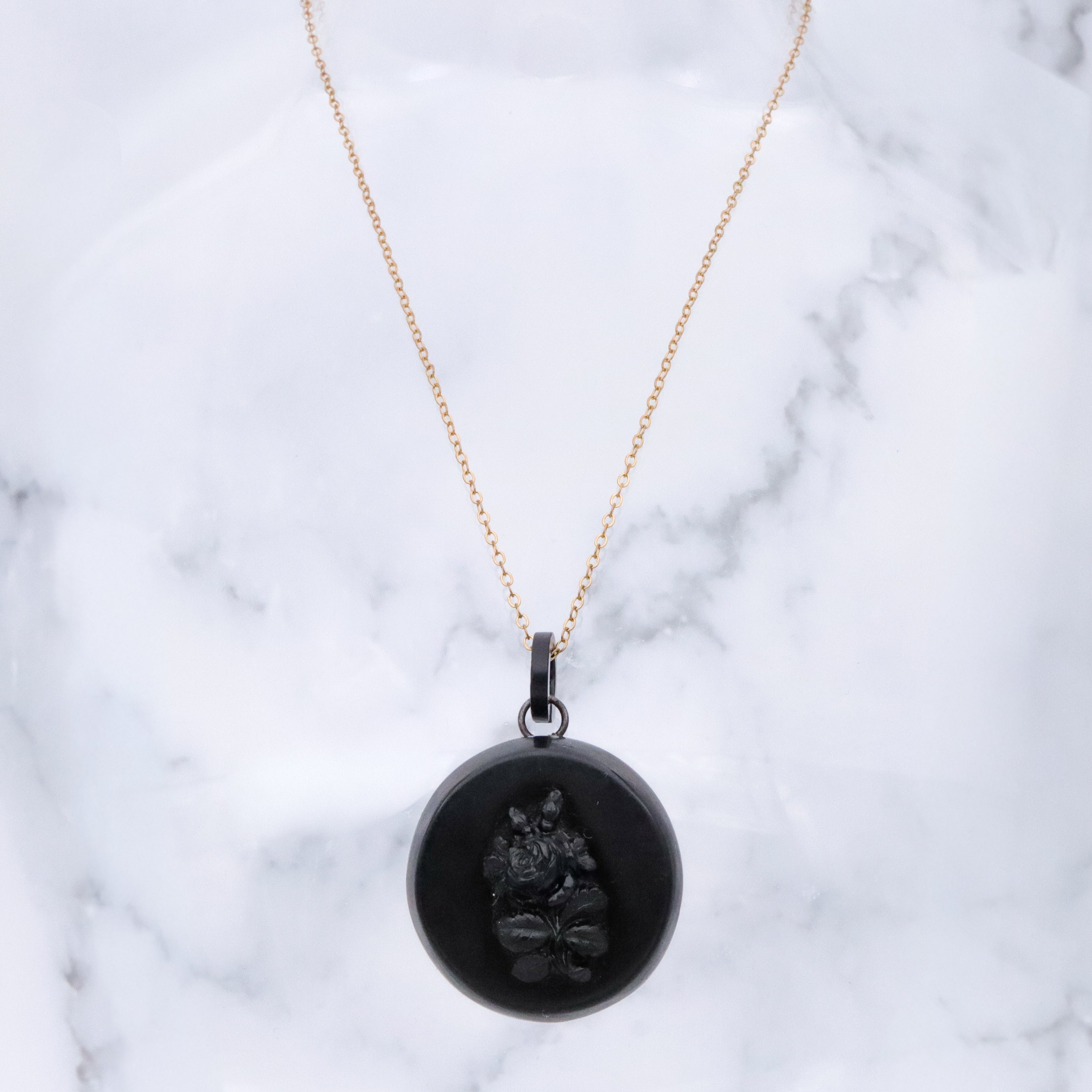 Victorian gutta percha flower round small mourning locket
