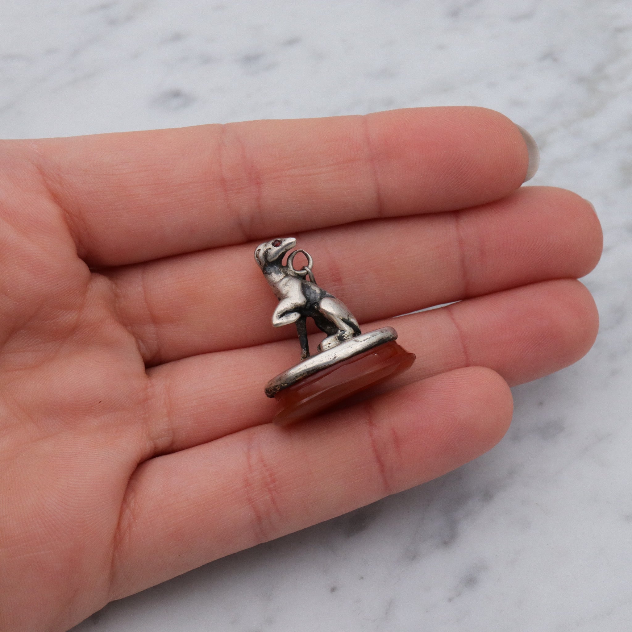 Early Victorian sterling silver greyhound dog on carnelian fob pendant