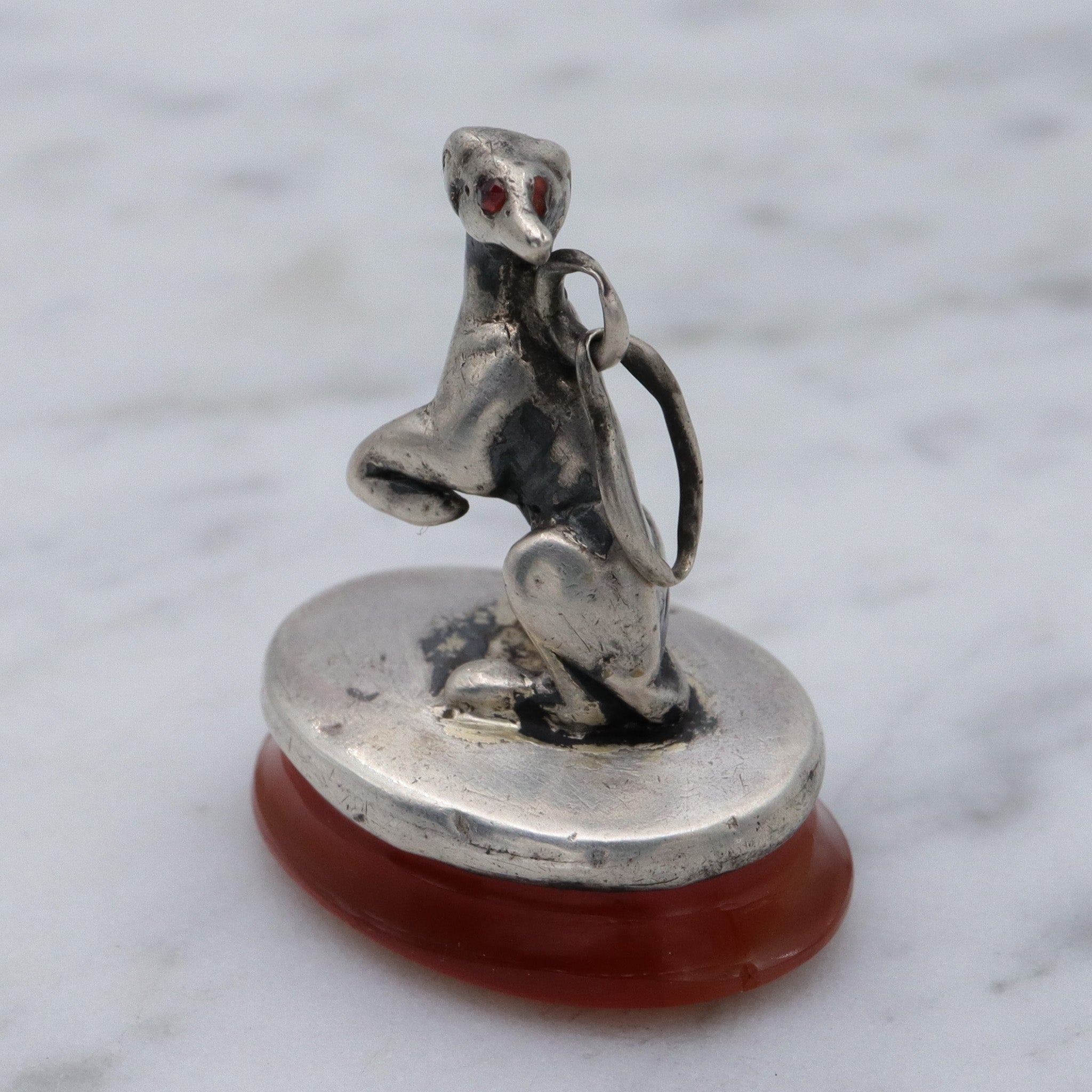 Early Victorian sterling silver greyhound dog on carnelian fob pendant
