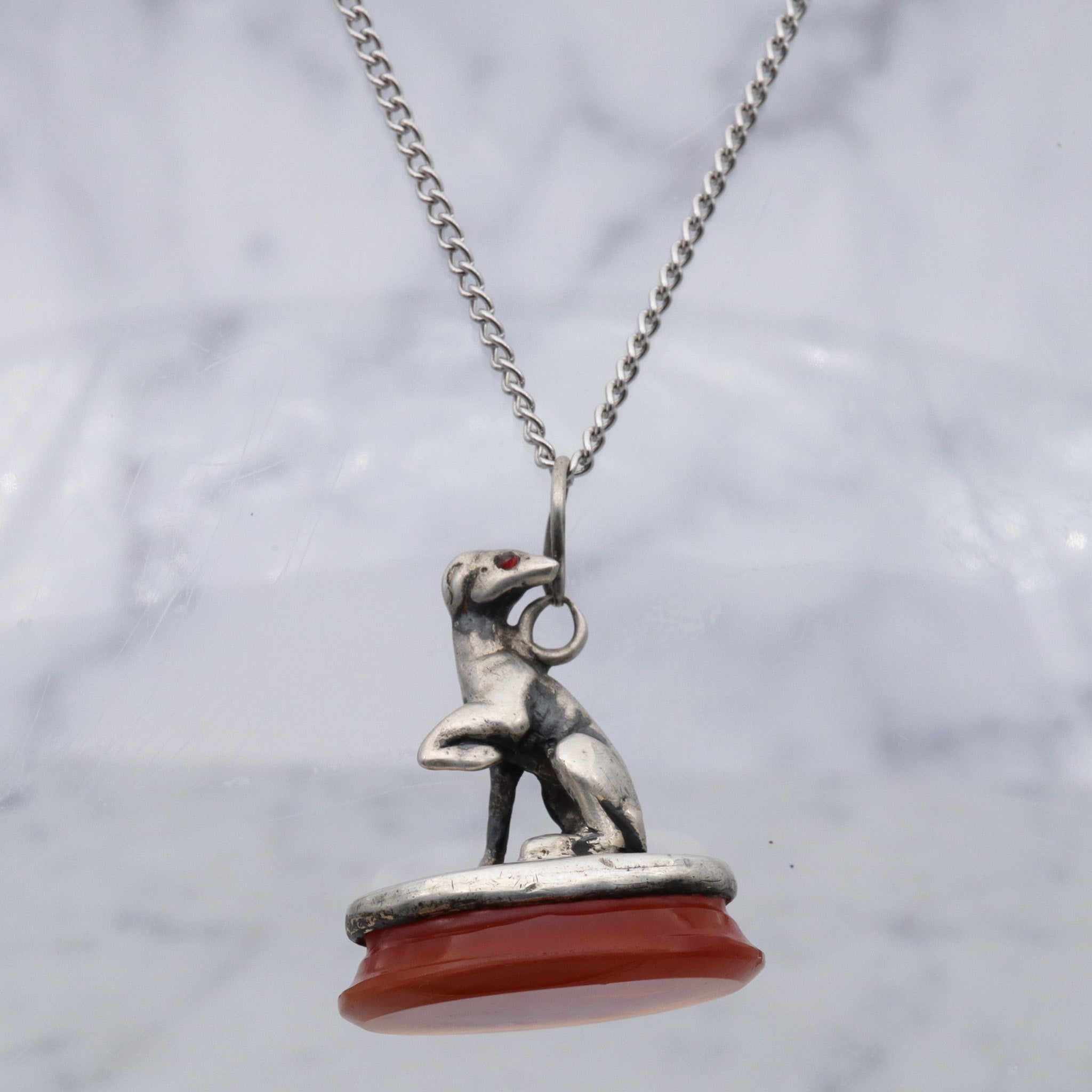 Early Victorian sterling silver greyhound dog on carnelian fob pendant