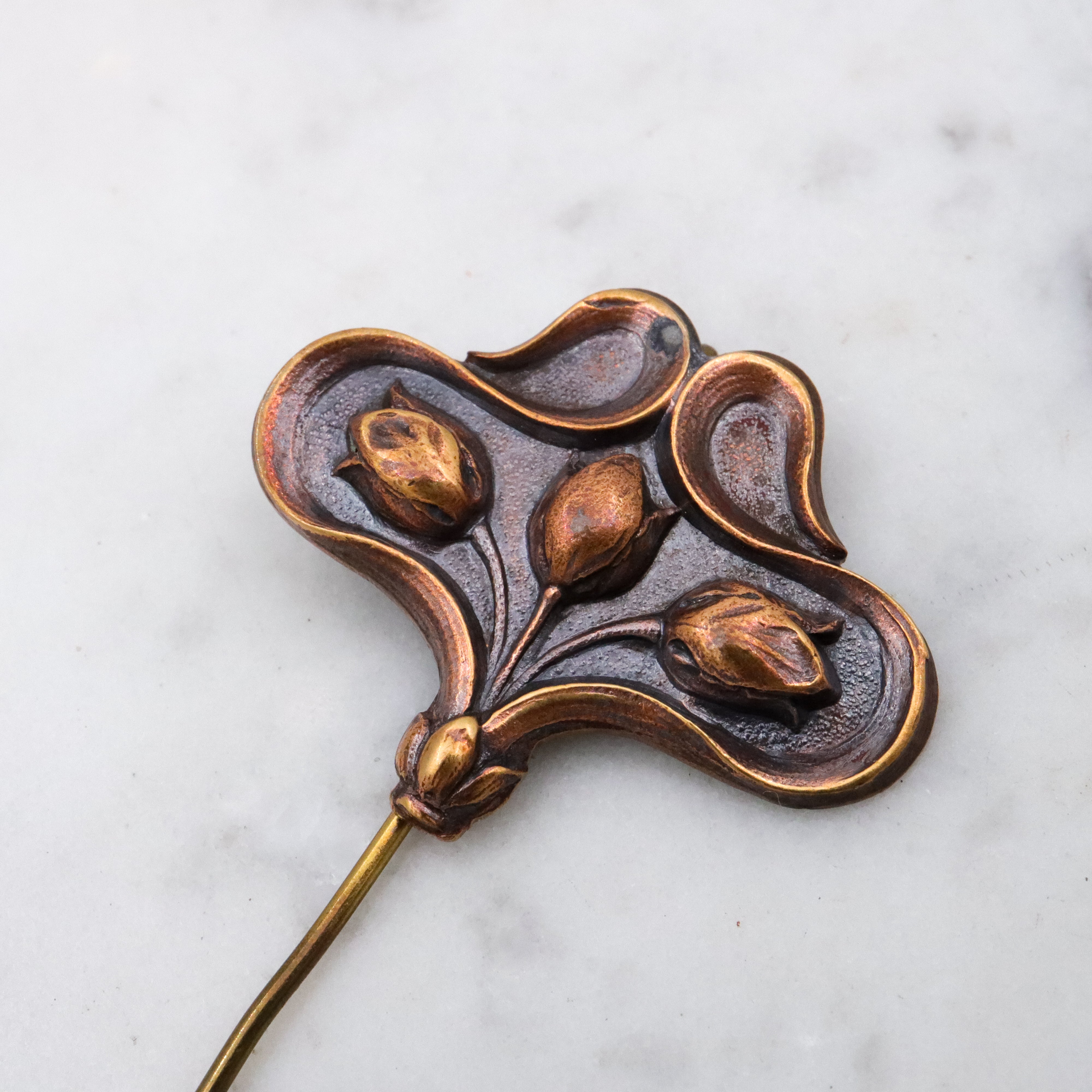 Art Nouveau copper floral stick pin brooch