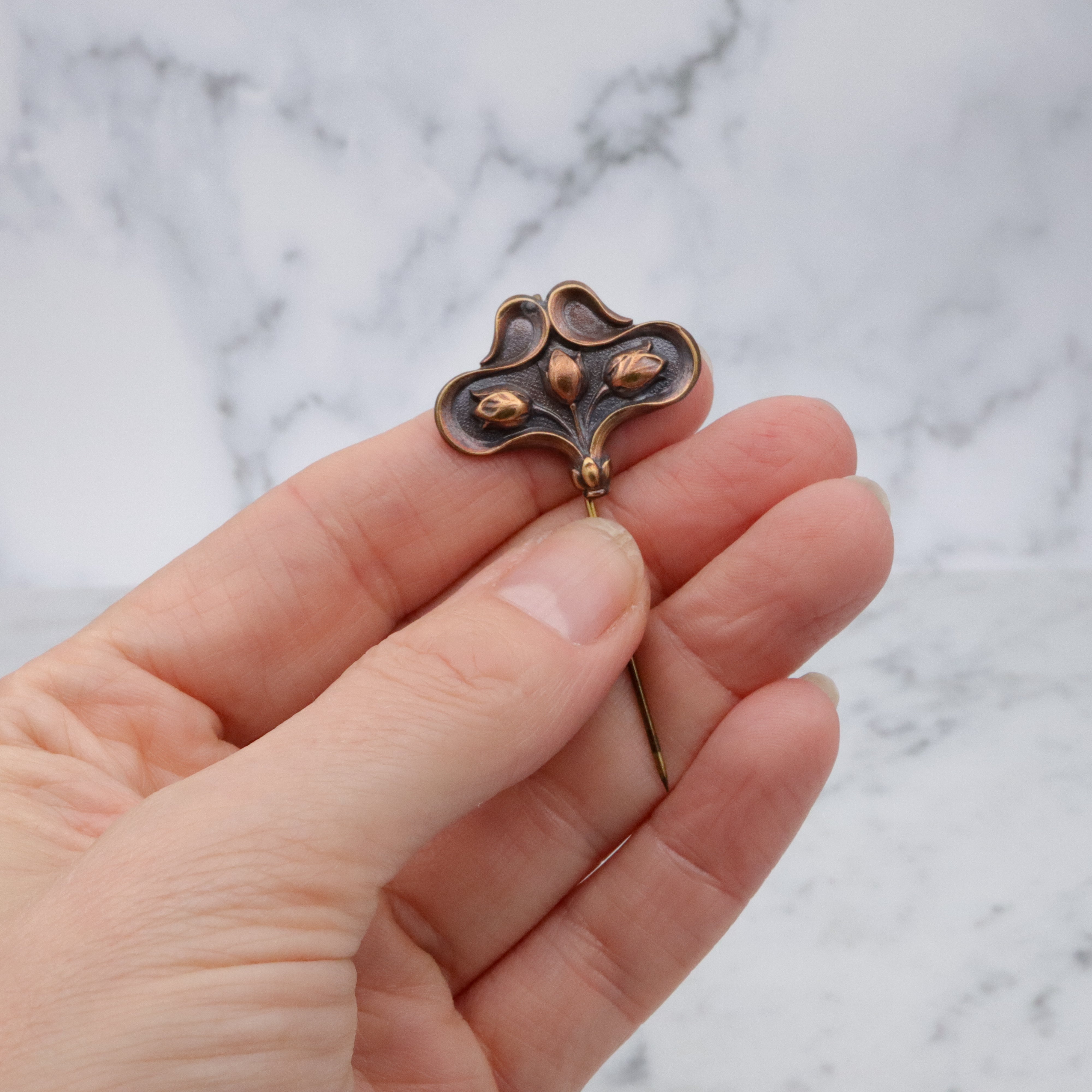 Art Nouveau copper floral stick pin brooch