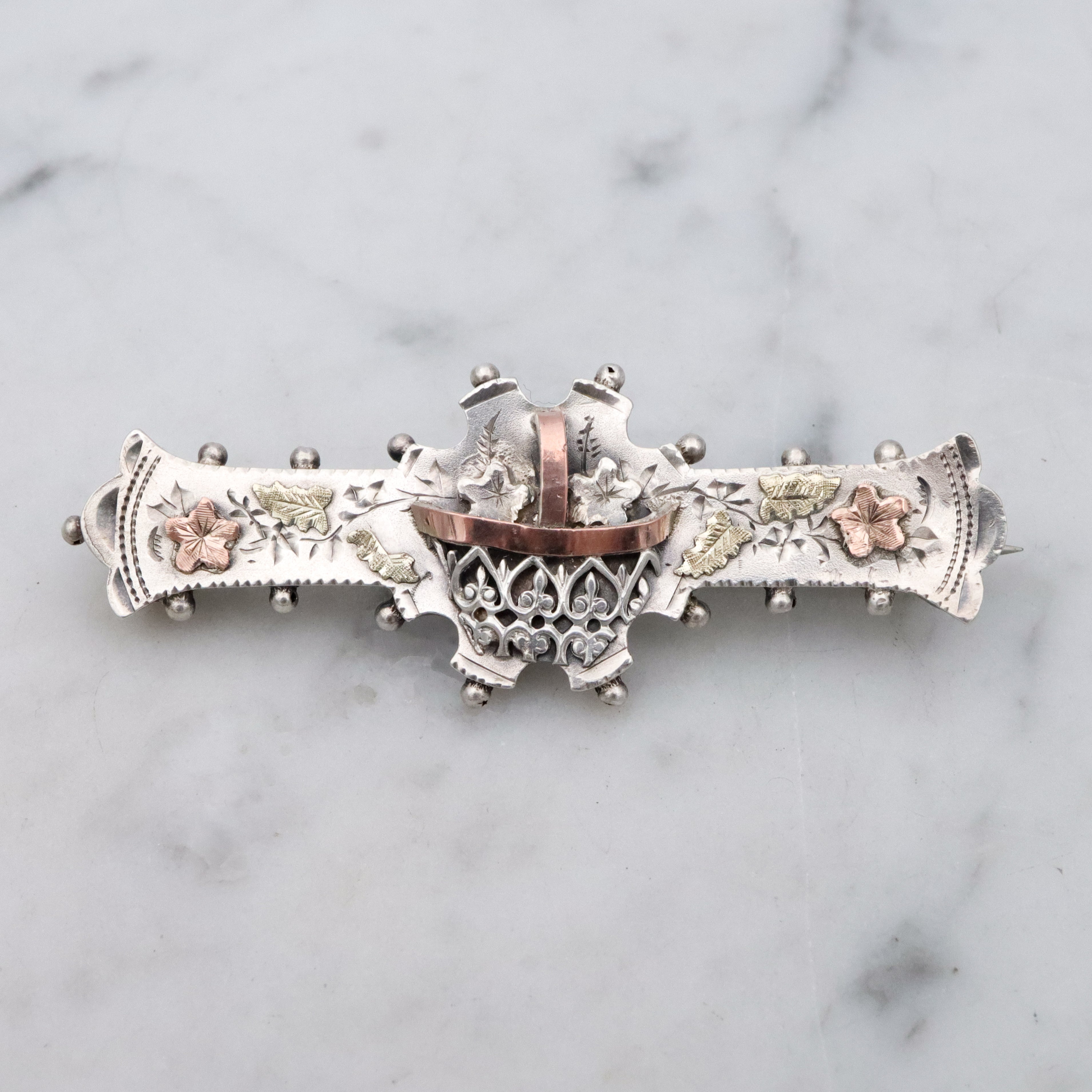 Victorian tri-color sterling Aesthetic Movement bar brooch with dimensional flower basket