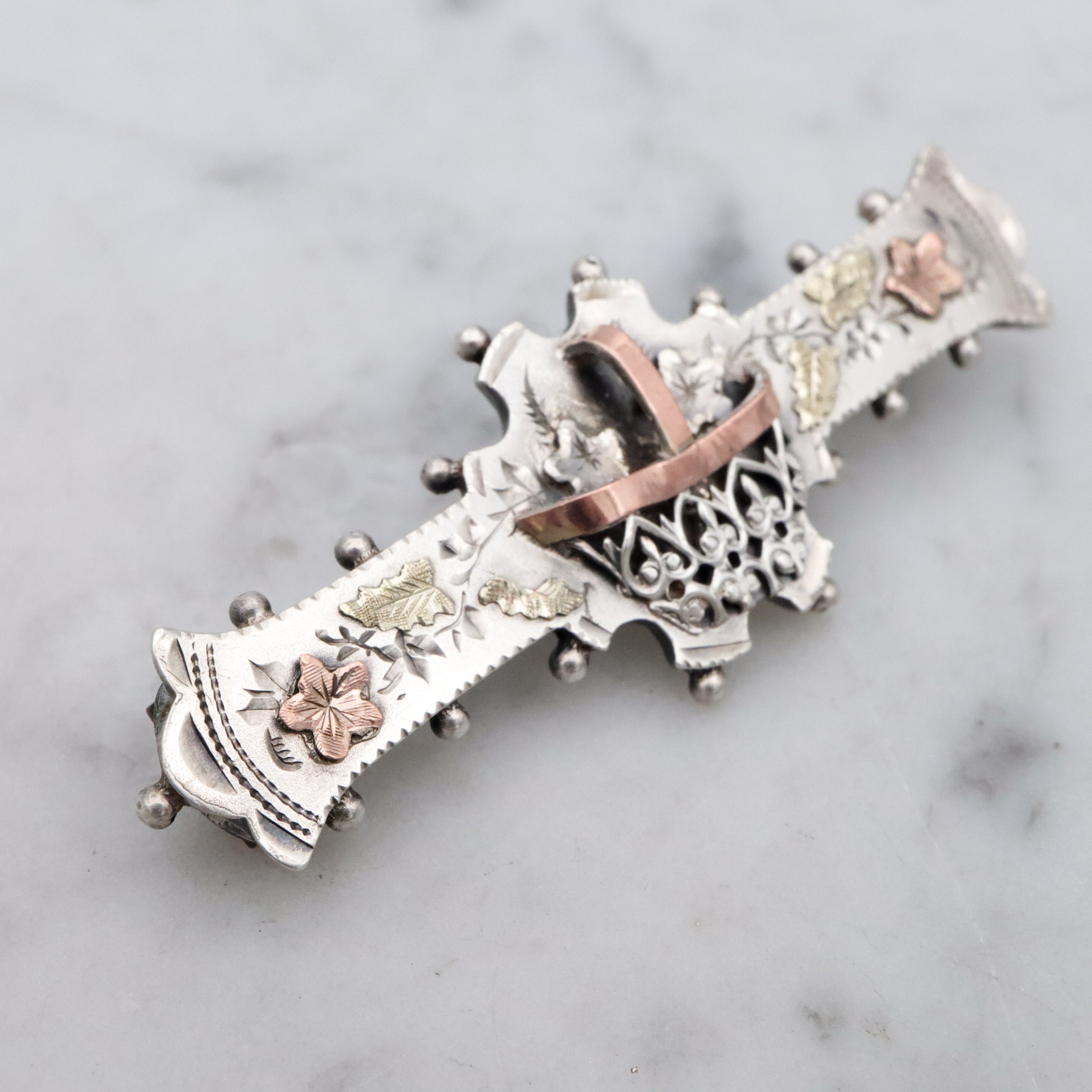 Victorian tri-color sterling Aesthetic Movement bar brooch with dimensional flower basket