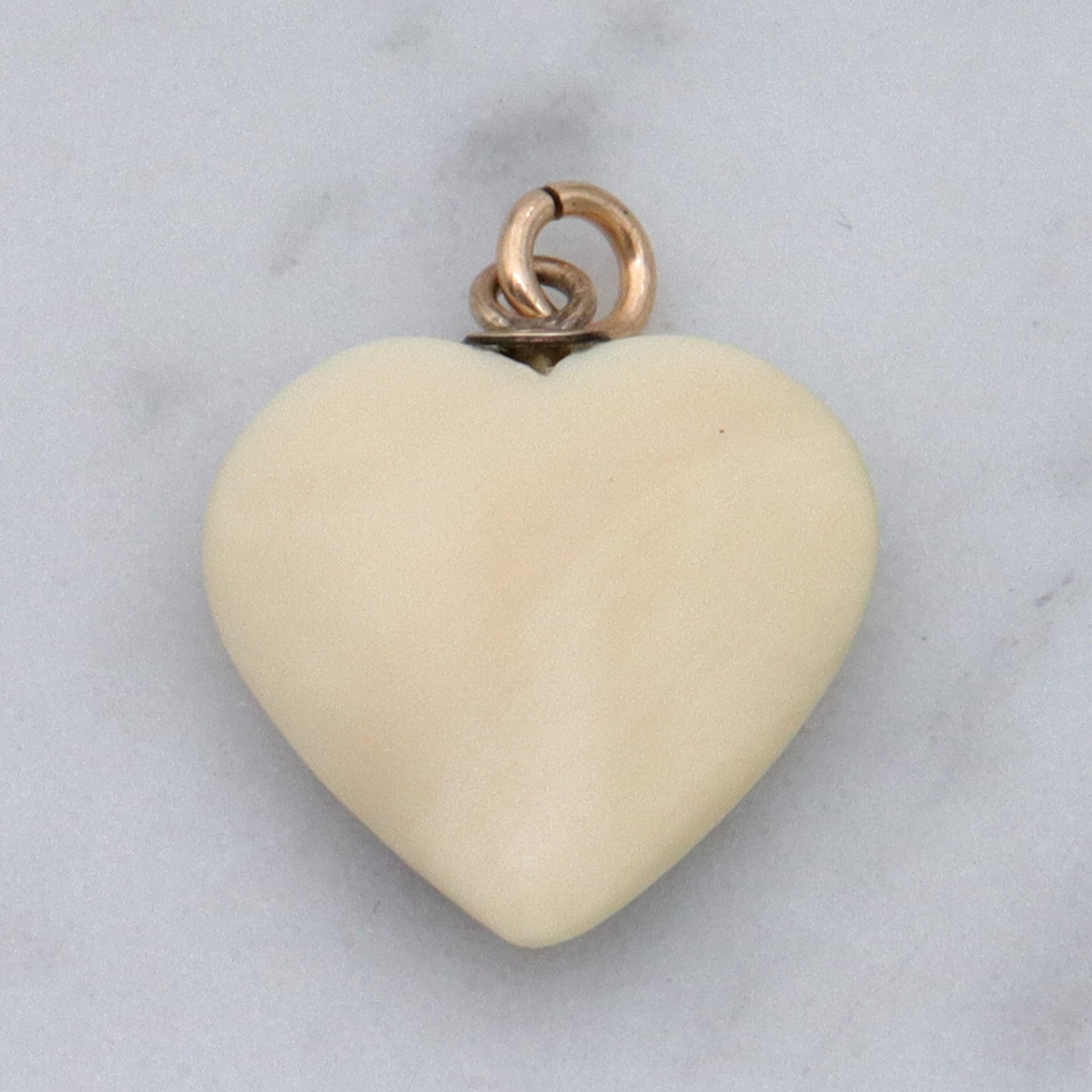 Antique hand carved faux ivory sailboat heart charm pendant