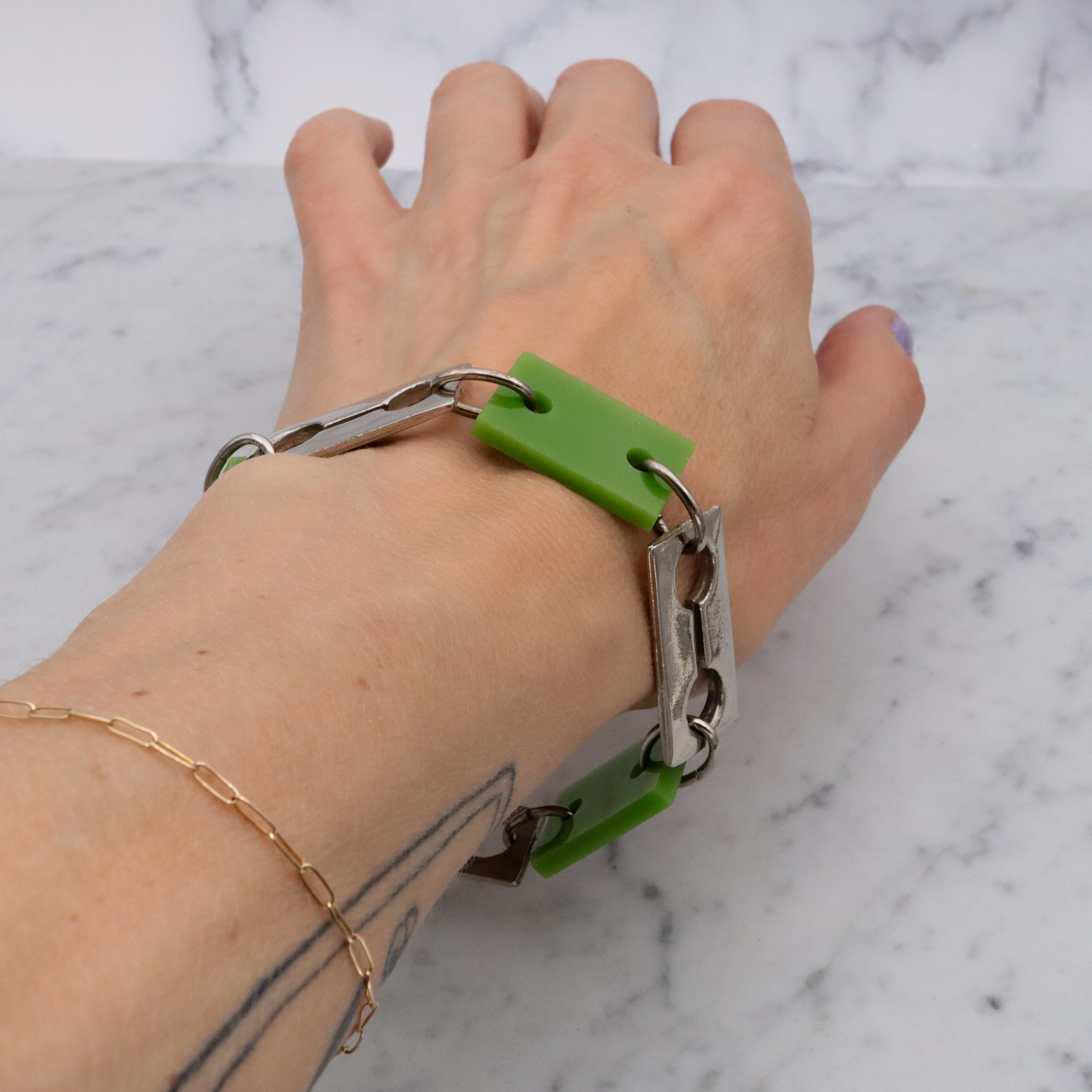Mid Century Celebrity N.Y. lime green & silver tone razor blade style link bracelet