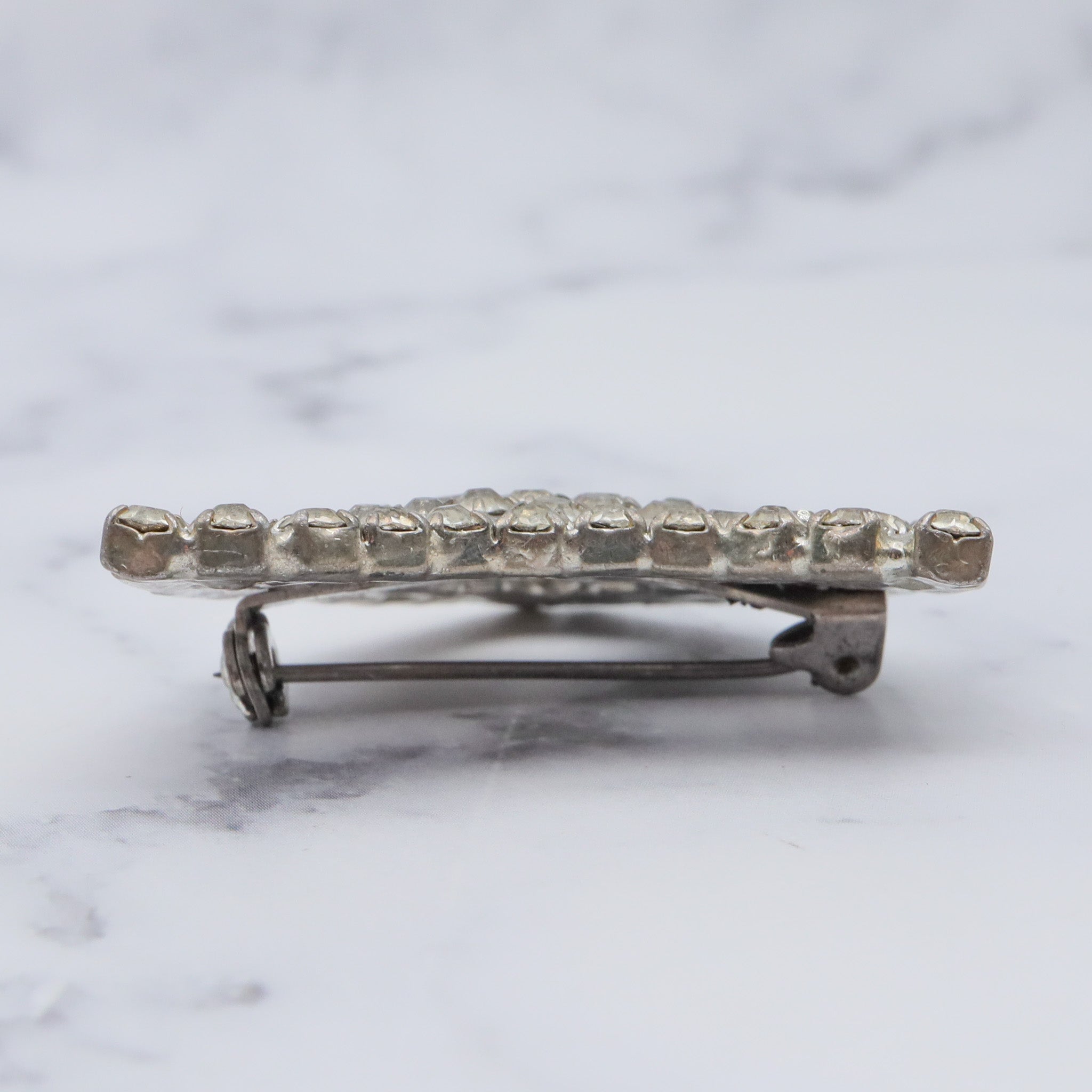 Antique masquerade mask silver tone brooch with rhinestones