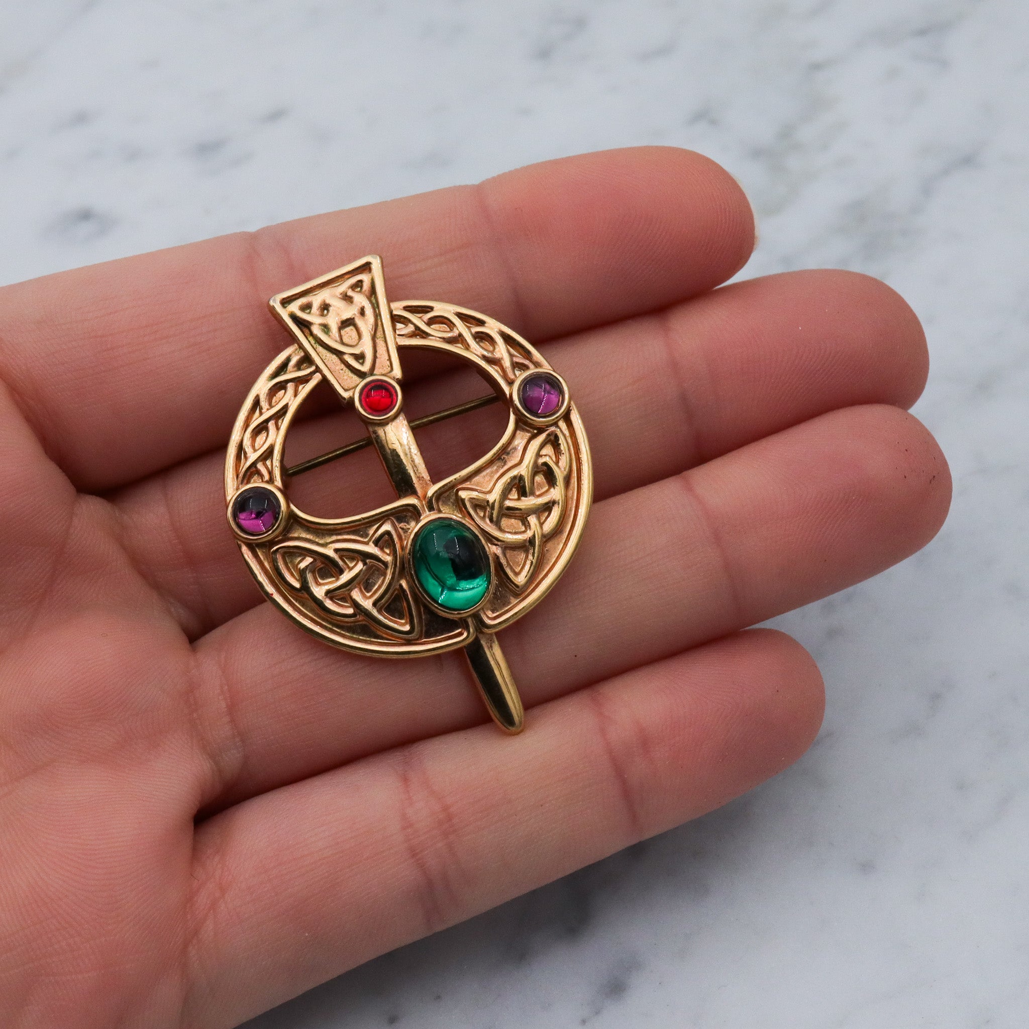 Vintage gold plated Celtic penannular brooch with glass gems
