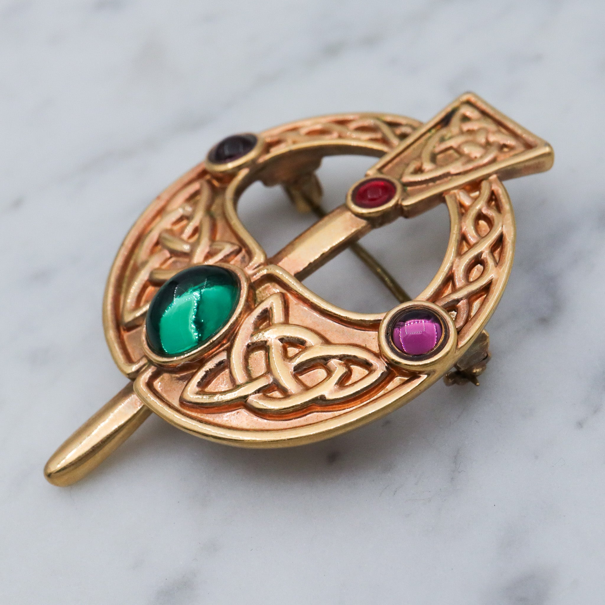 Vintage gold plated Celtic penannular brooch with glass gems