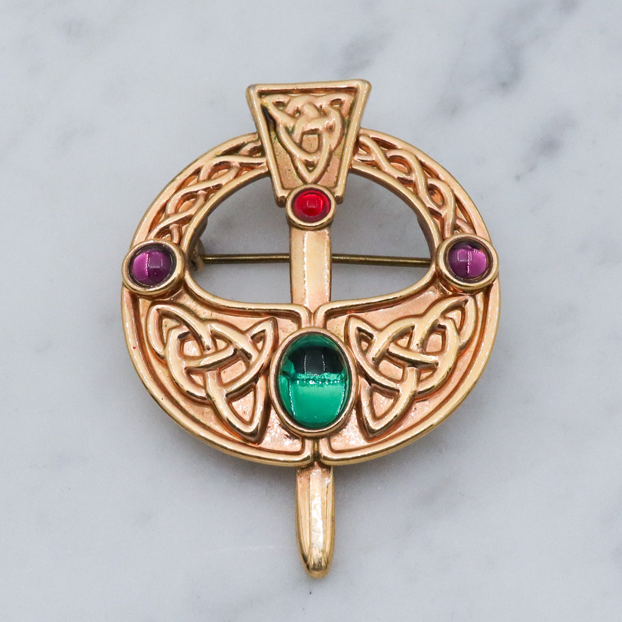 Vintage gold plated Celtic penannular brooch with glass gems