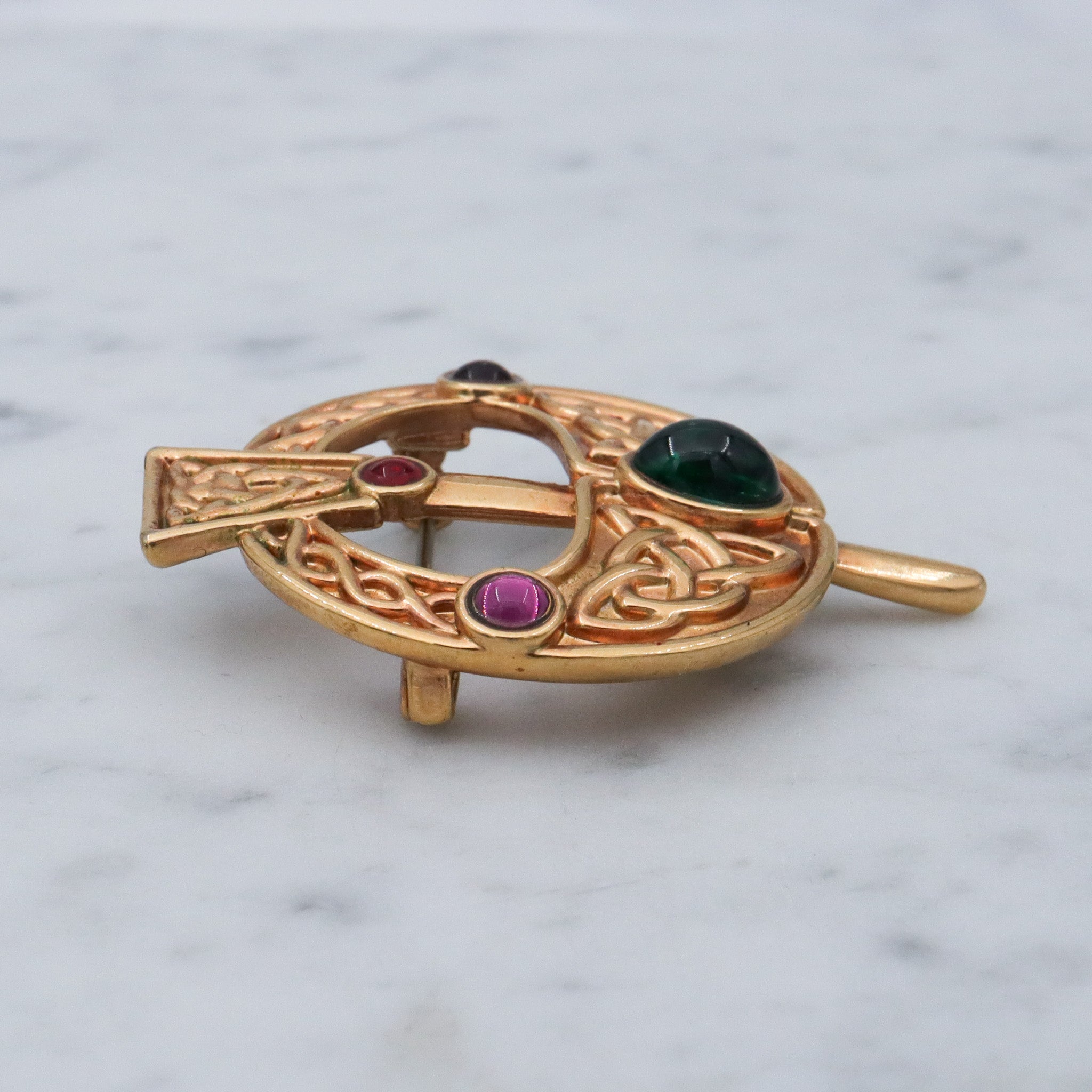 Vintage gold plated Celtic penannular brooch with glass gems