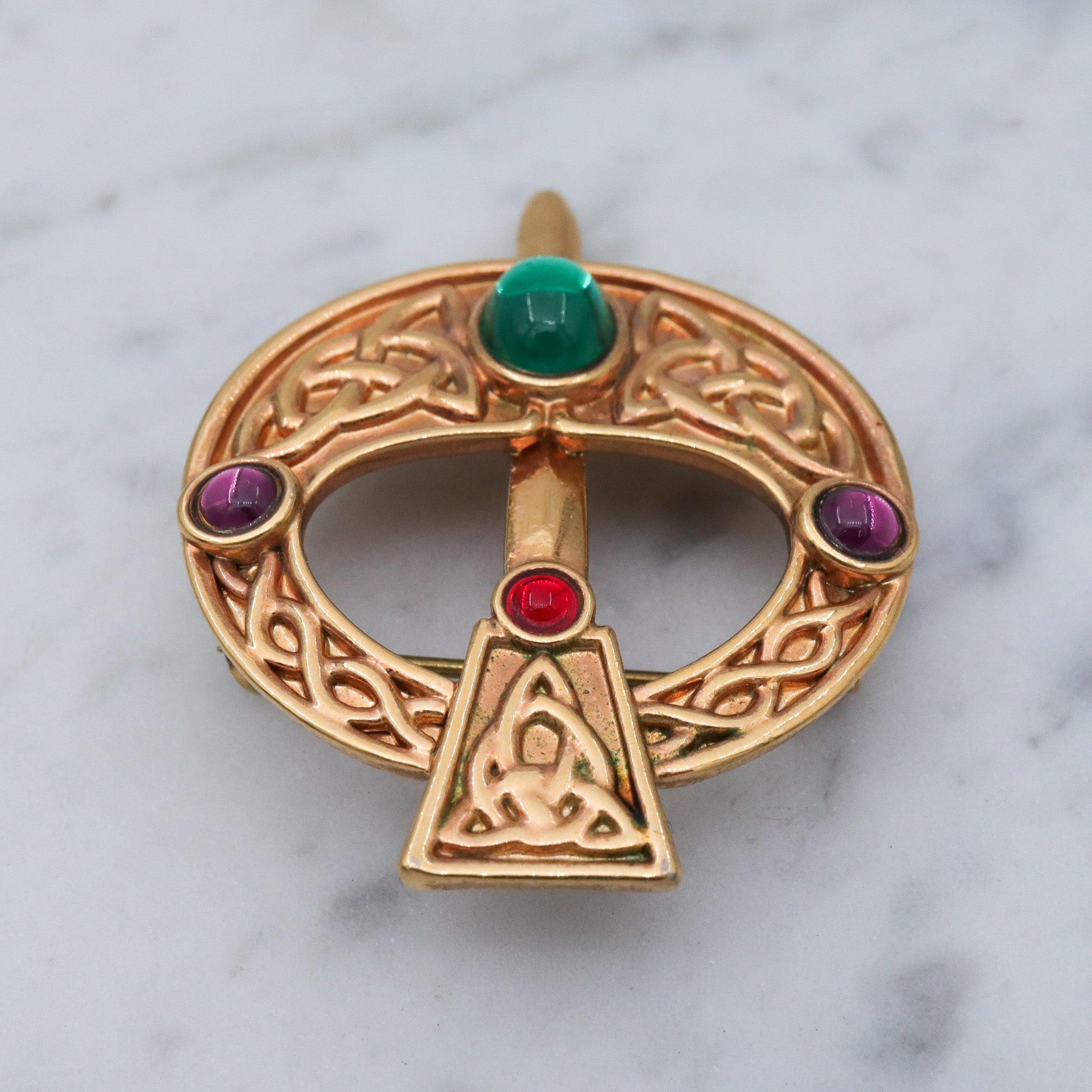 Vintage gold plated Celtic penannular brooch with glass gems