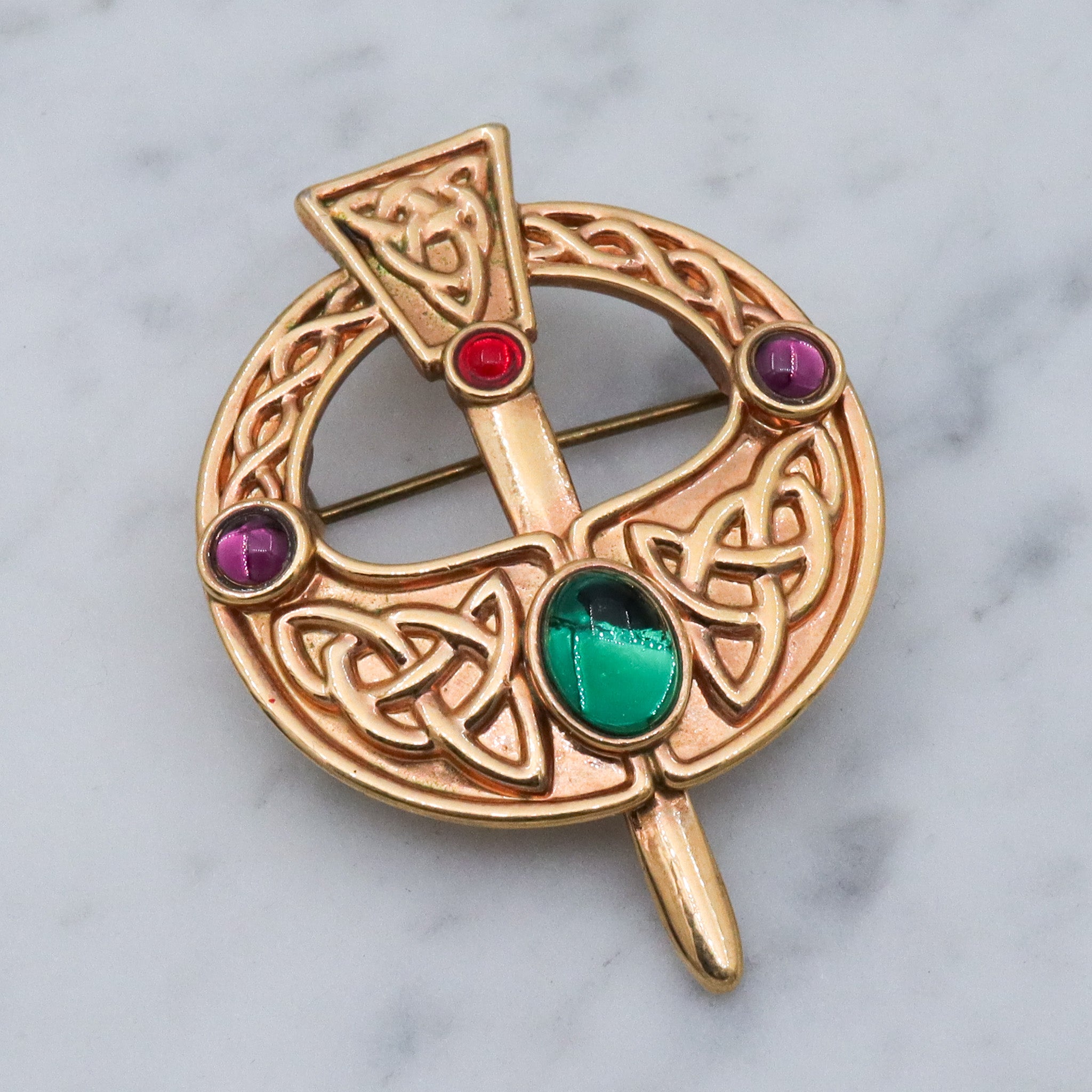 Vintage gold plated Celtic penannular brooch with glass gems
