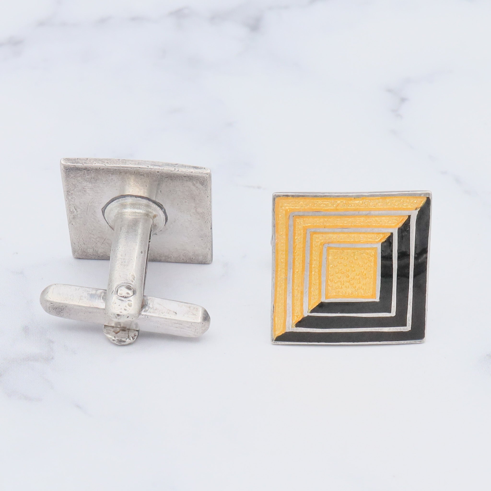 Antique Deco Margot de Taxco sterling cufflinks with black and gold enamel