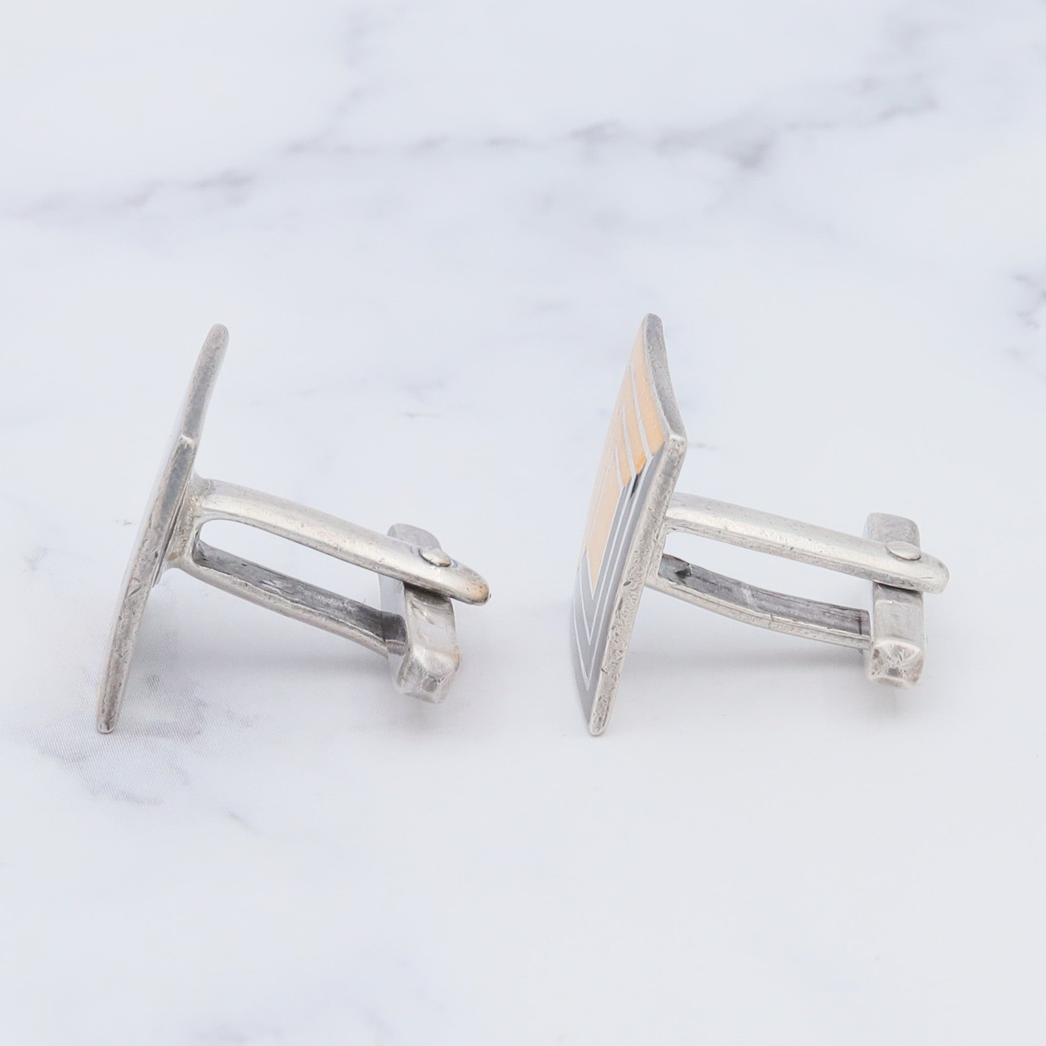 Antique Deco Margot de Taxco sterling cufflinks with black and gold enamel