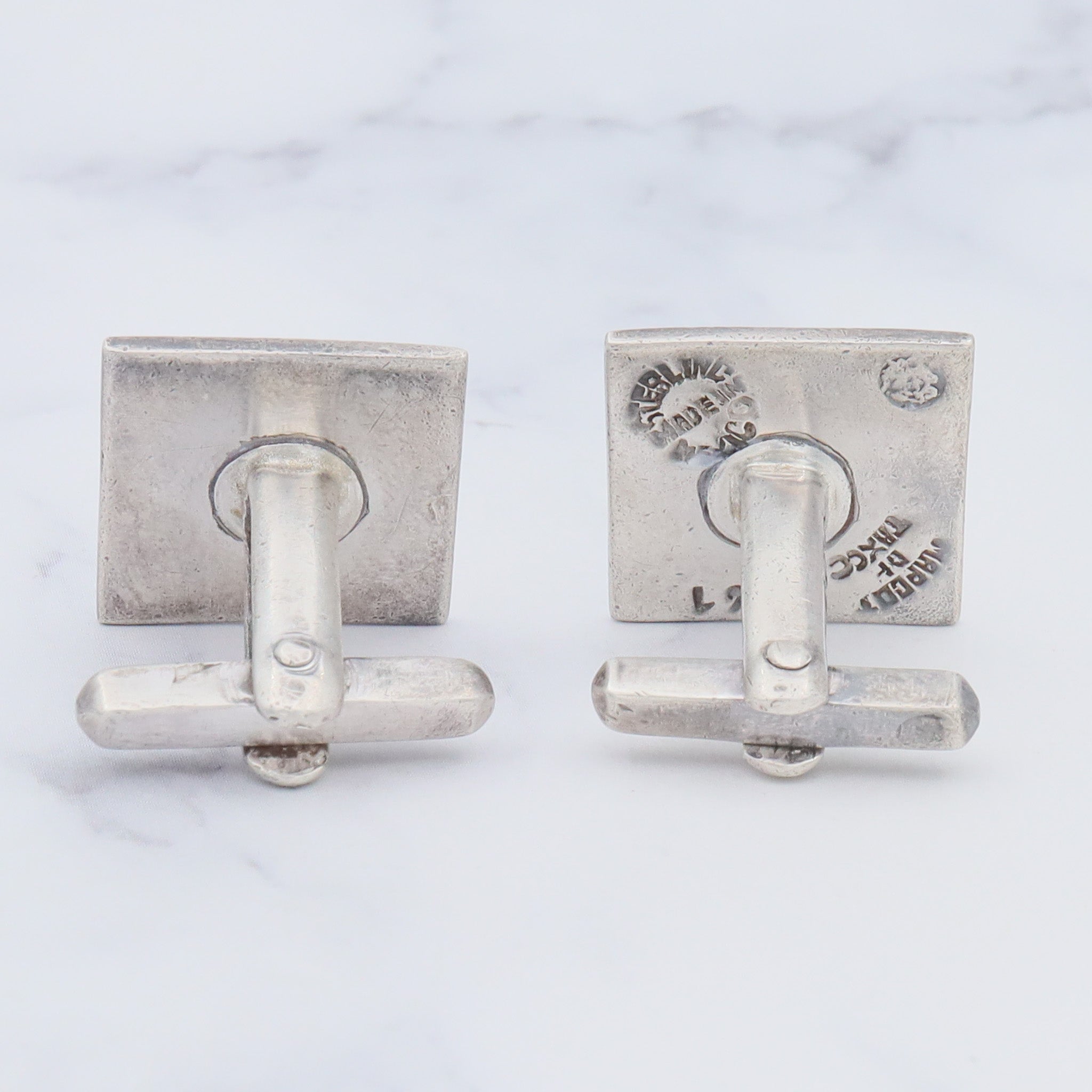 Antique Deco Margot de Taxco sterling cufflinks with black and gold enamel