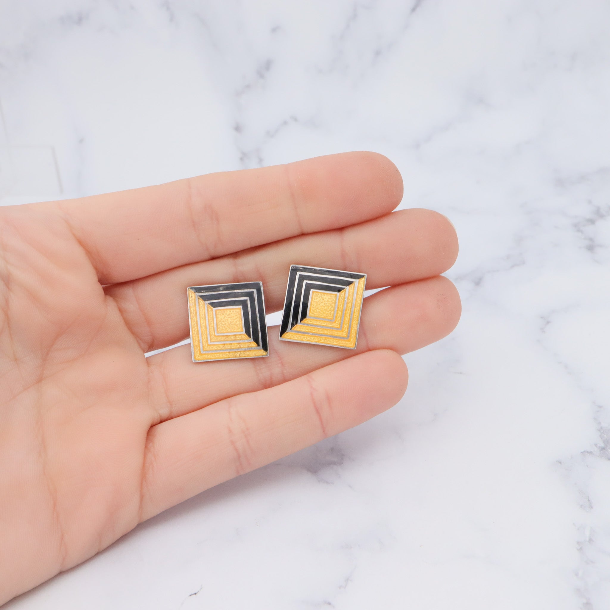 Antique Deco Margot de Taxco sterling cufflinks with black and gold enamel