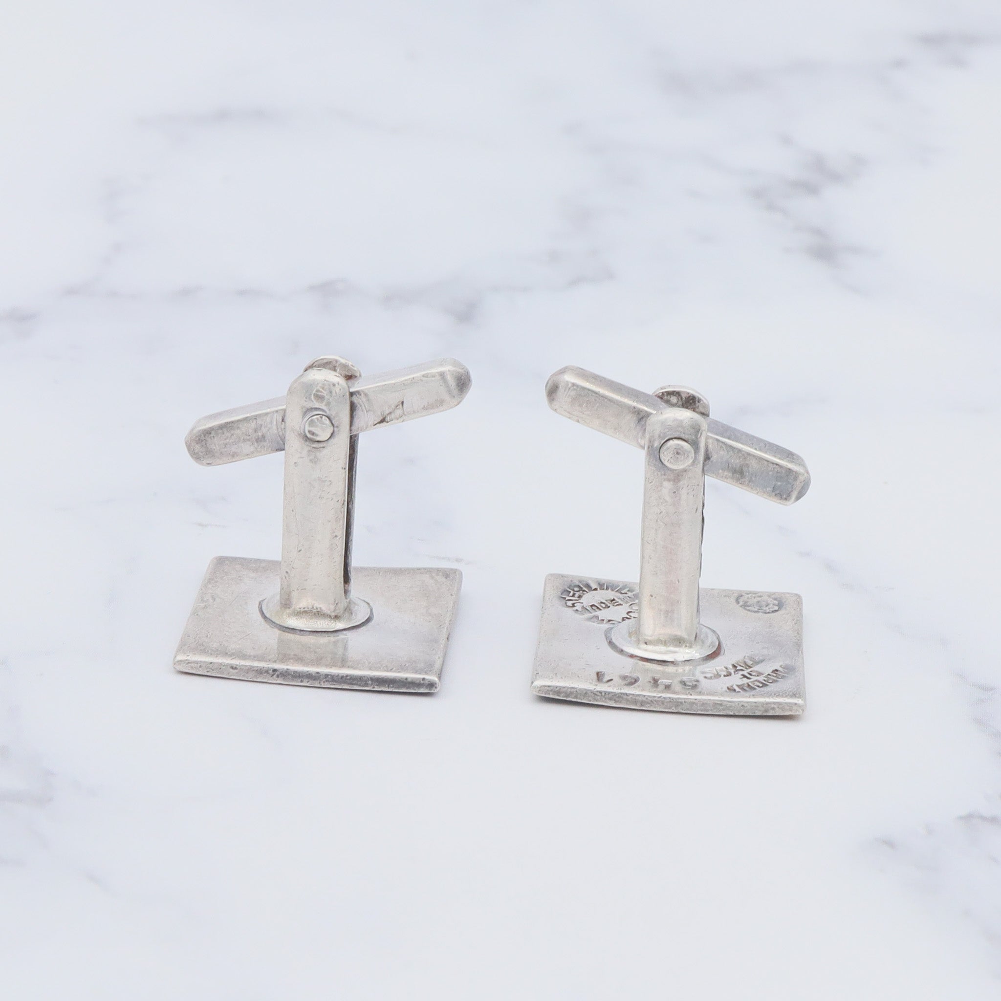 Antique Deco Margot de Taxco sterling cufflinks with black and gold enamel