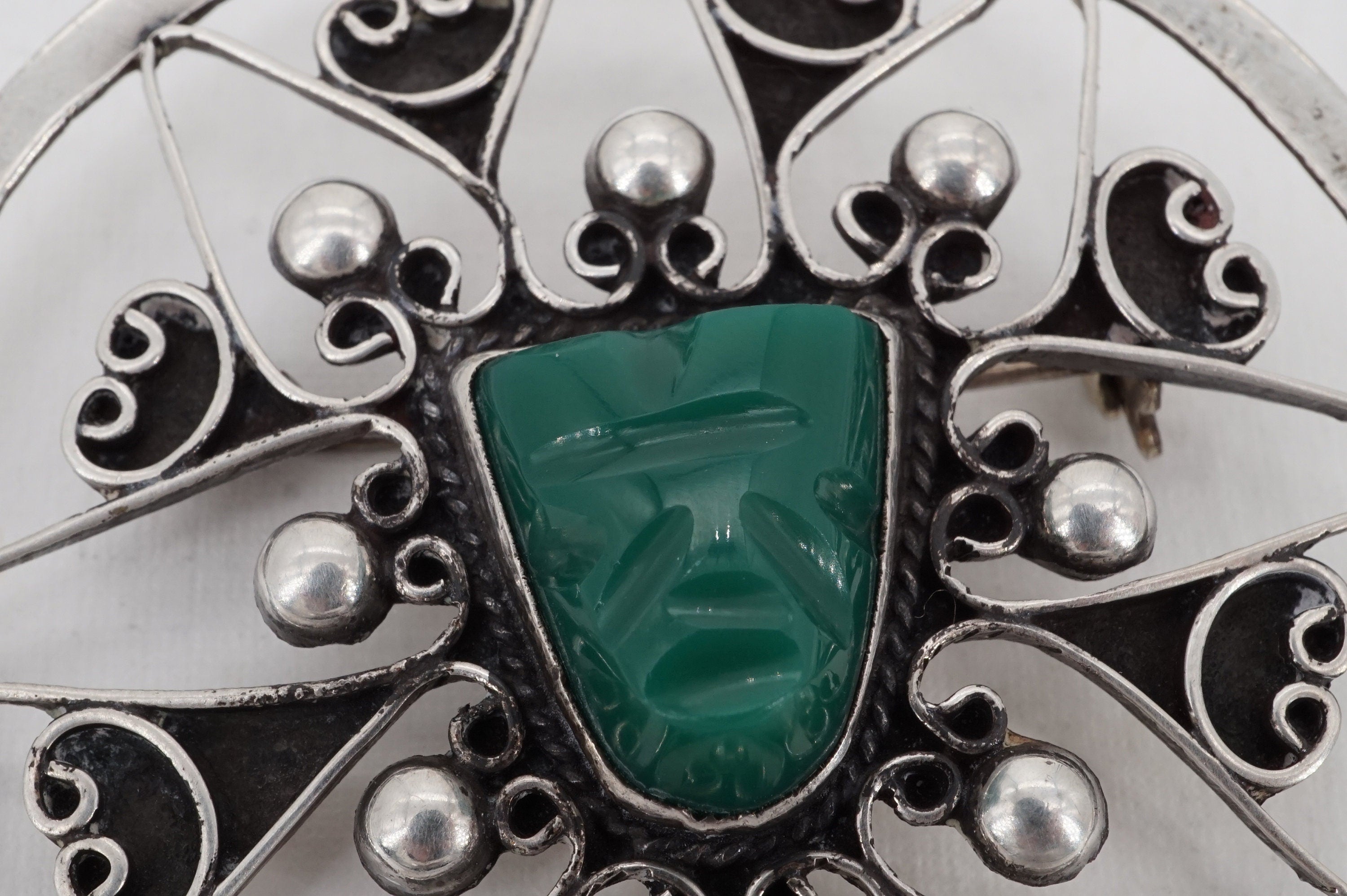 vintage mexican sterling silver green onyx aztec mask medallion brooch