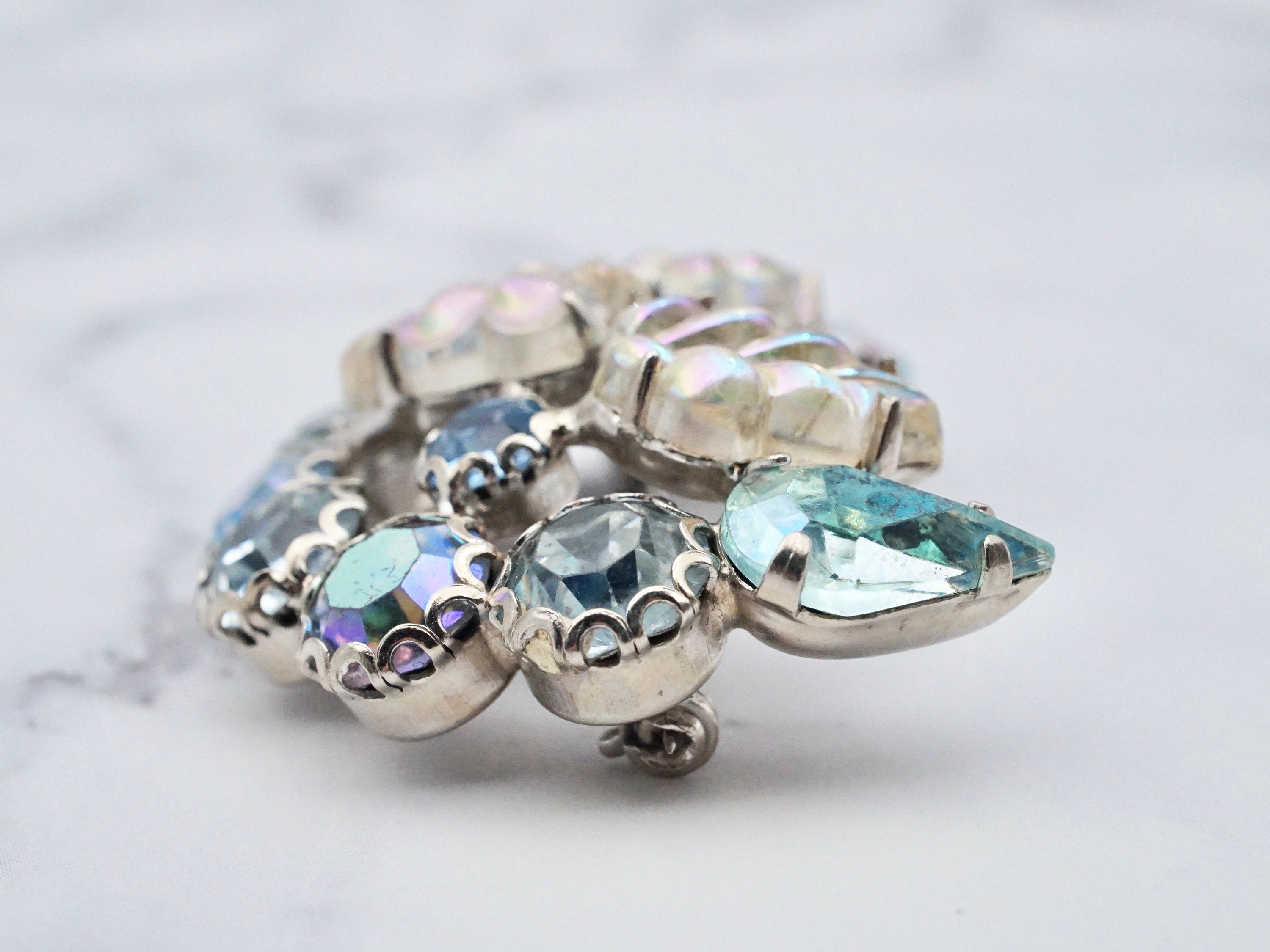 Vintage Weiss molded iridescent rhinestone silver tone brooch
