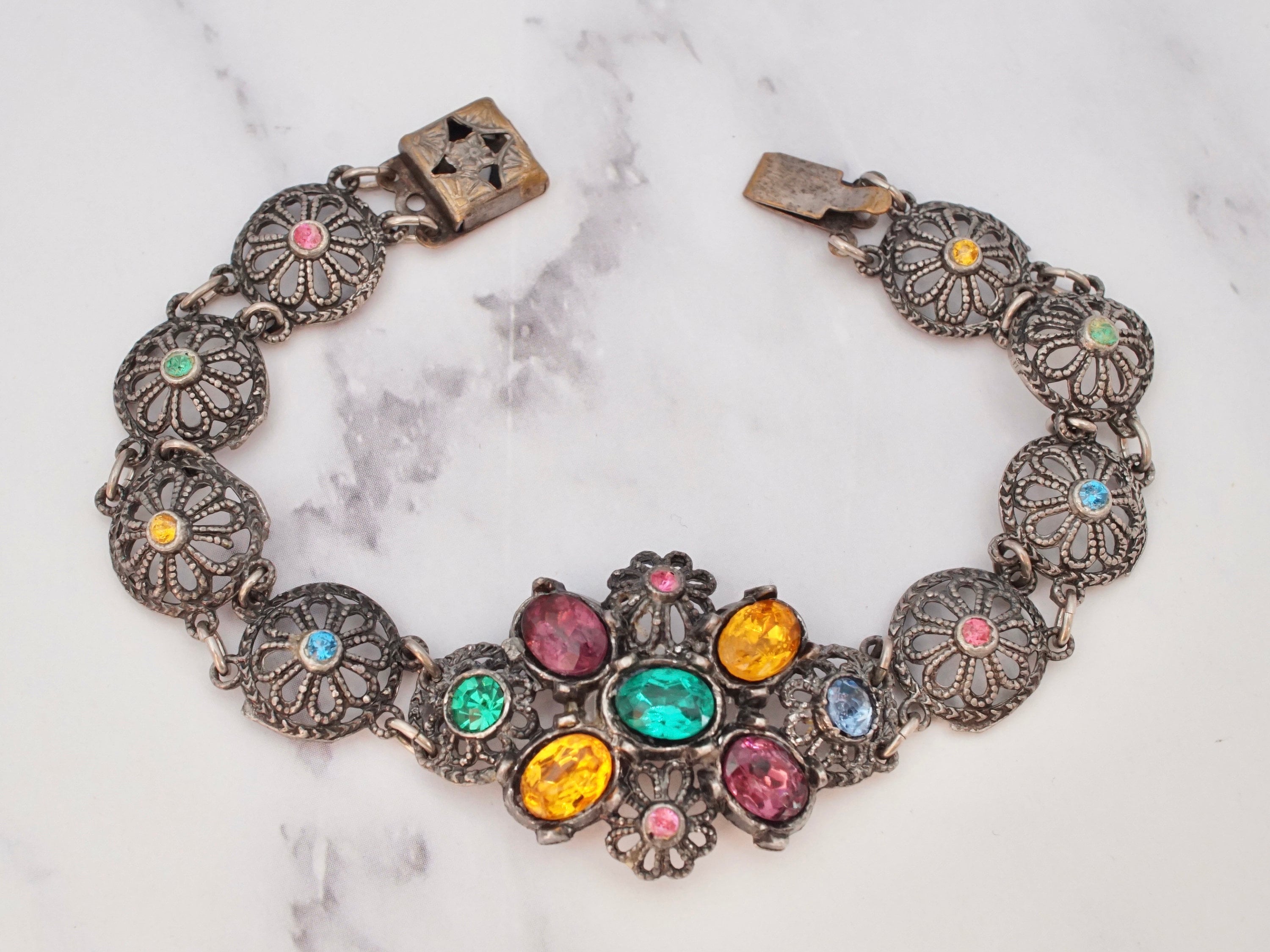 Antique harlequin Czech glass and metal filigree bracelet