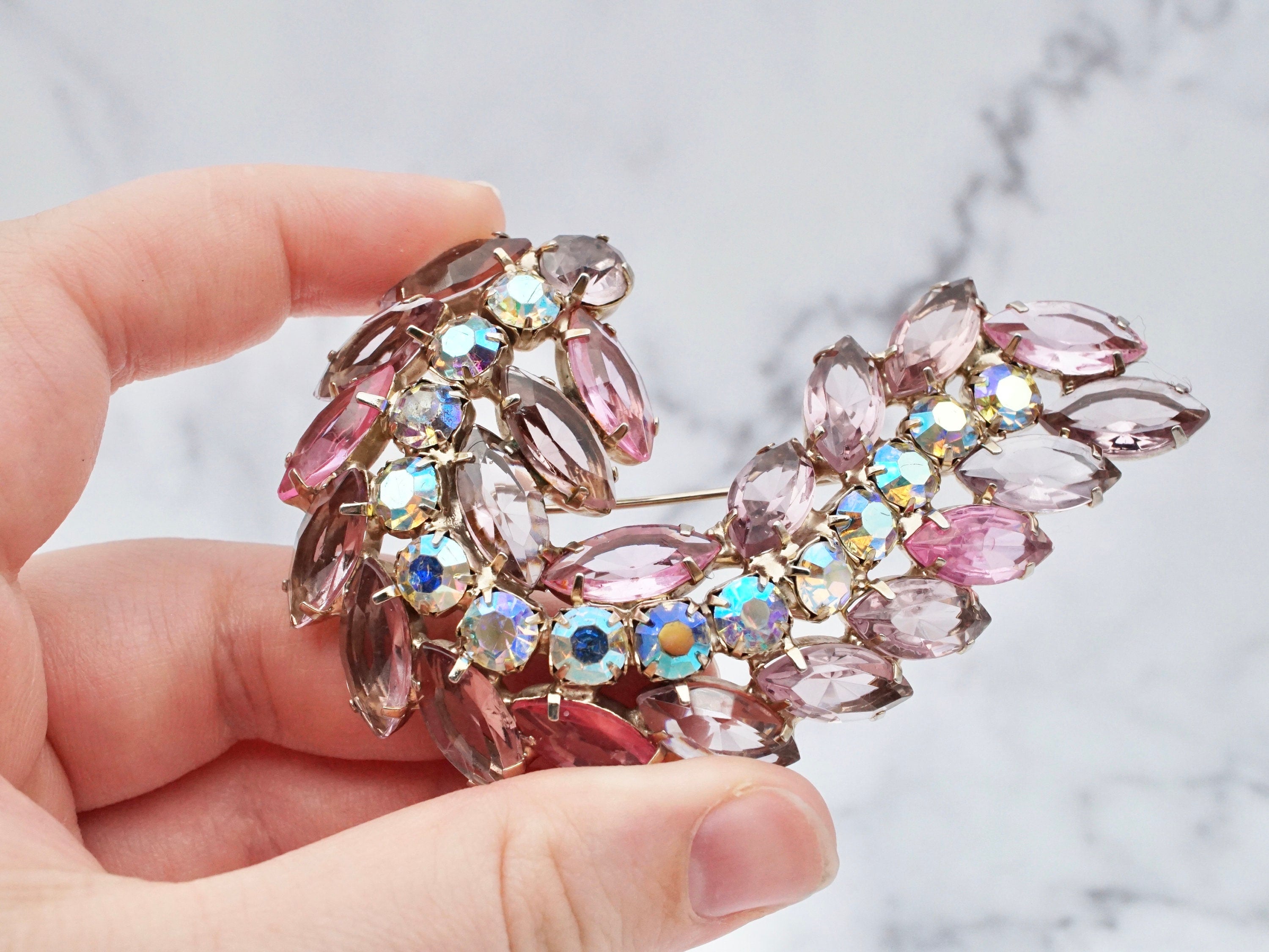 Vintage large lavender & aurora borealis rhinestone open-back swirl leaf brooch