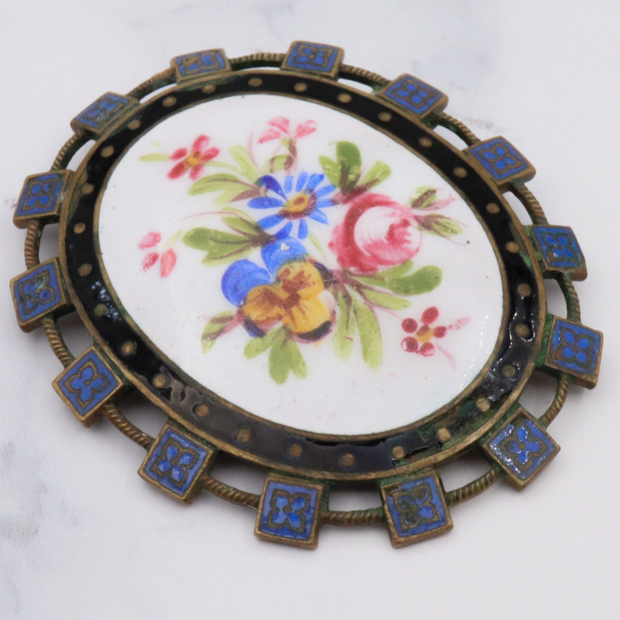 Antique Victorian hand-painted enamel and gilt metal brooch