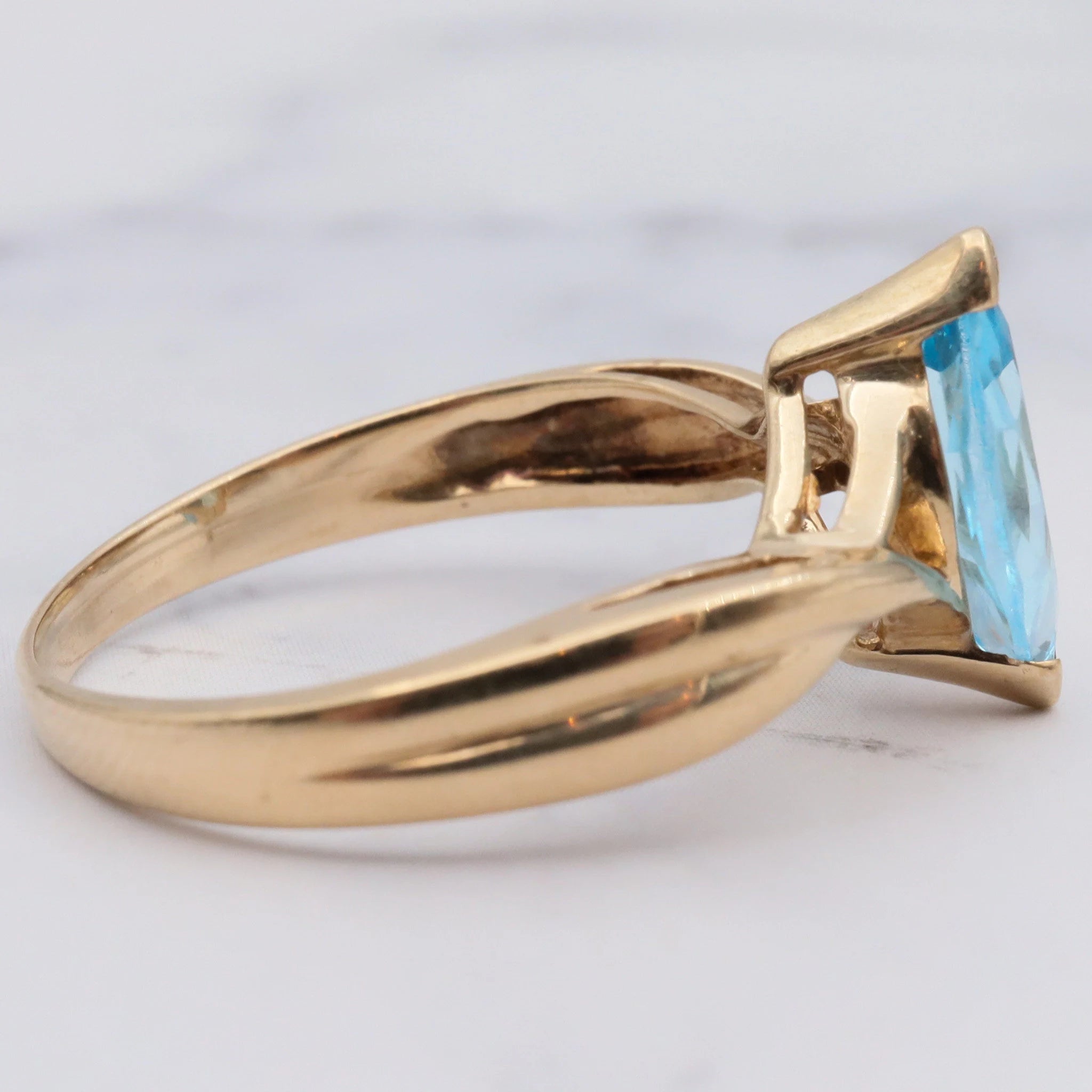 Retro 10k gold and marquise cut blue topaz ring, size 7