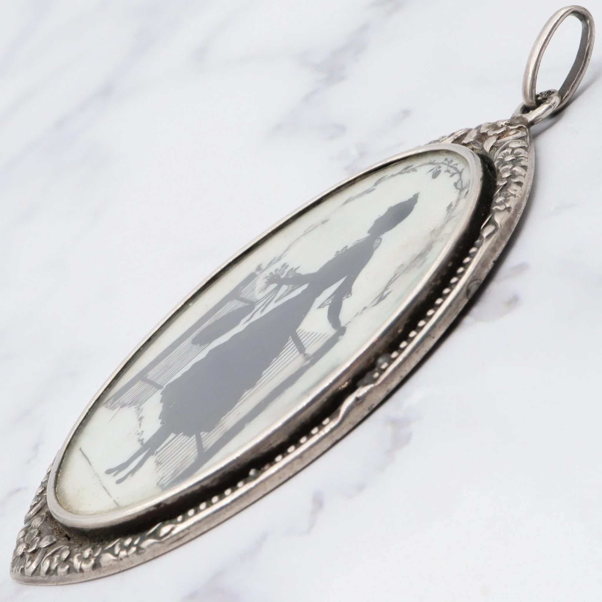 Antique Victorian sterling hand painted silhouette portrait pendant