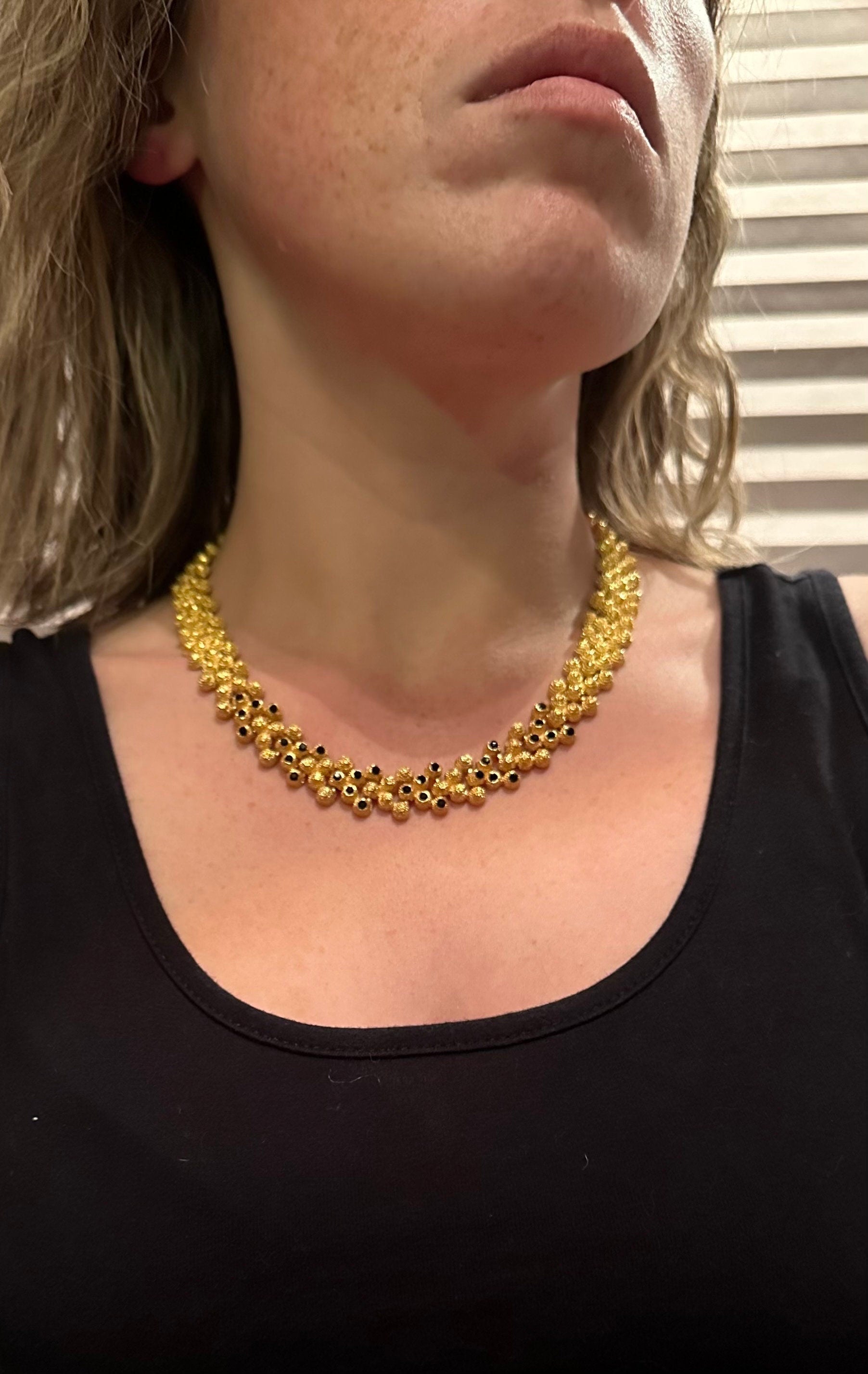 Vintage gold plated textured attached bead necklace with black glass tips